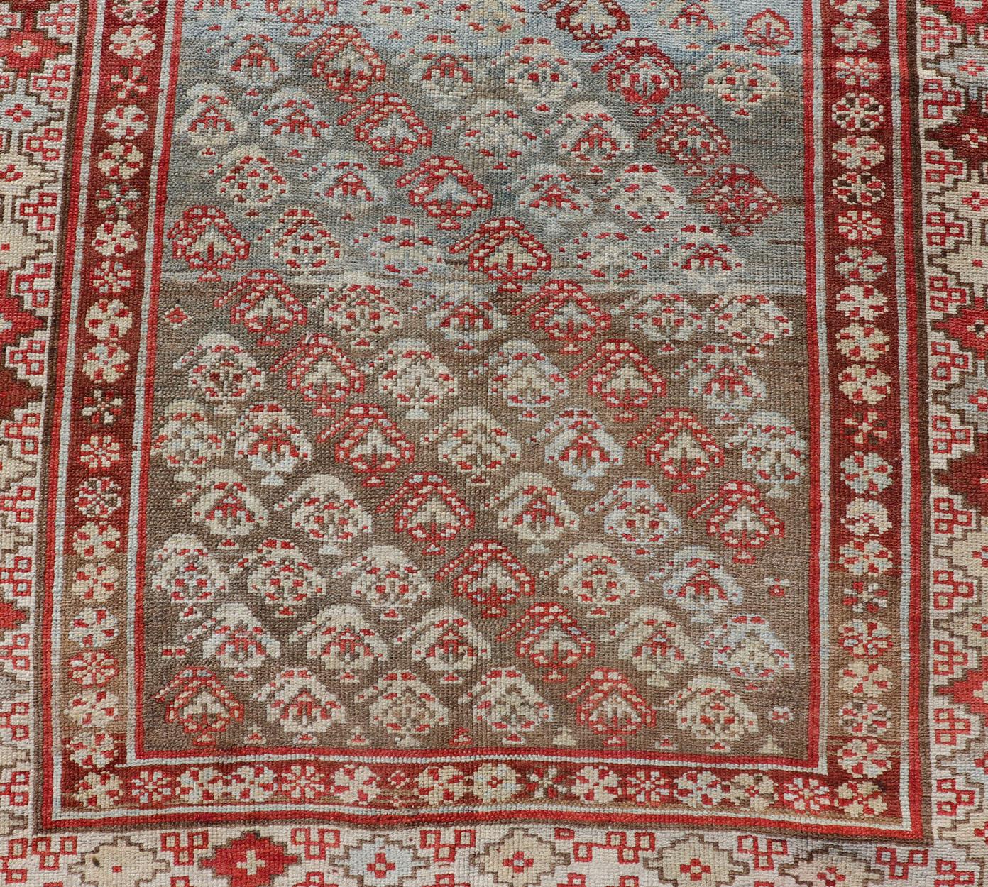 Antique Kurdish Runner in Soft Tones in Wool with Sub-Geometric Paisley Design For Sale 2