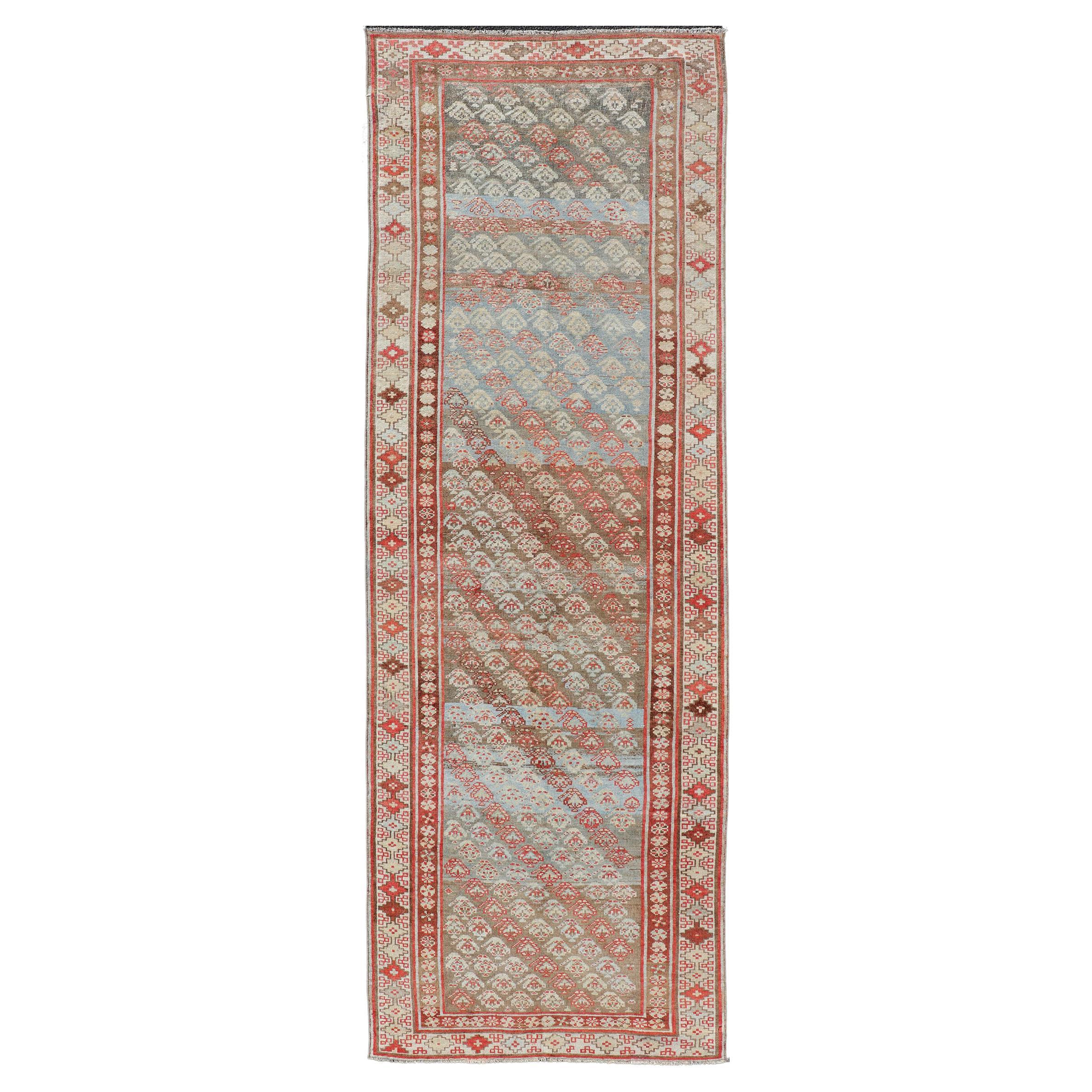 Antique Kurdish Runner in Soft Tones in Wool with Sub-Geometric Paisley Design For Sale