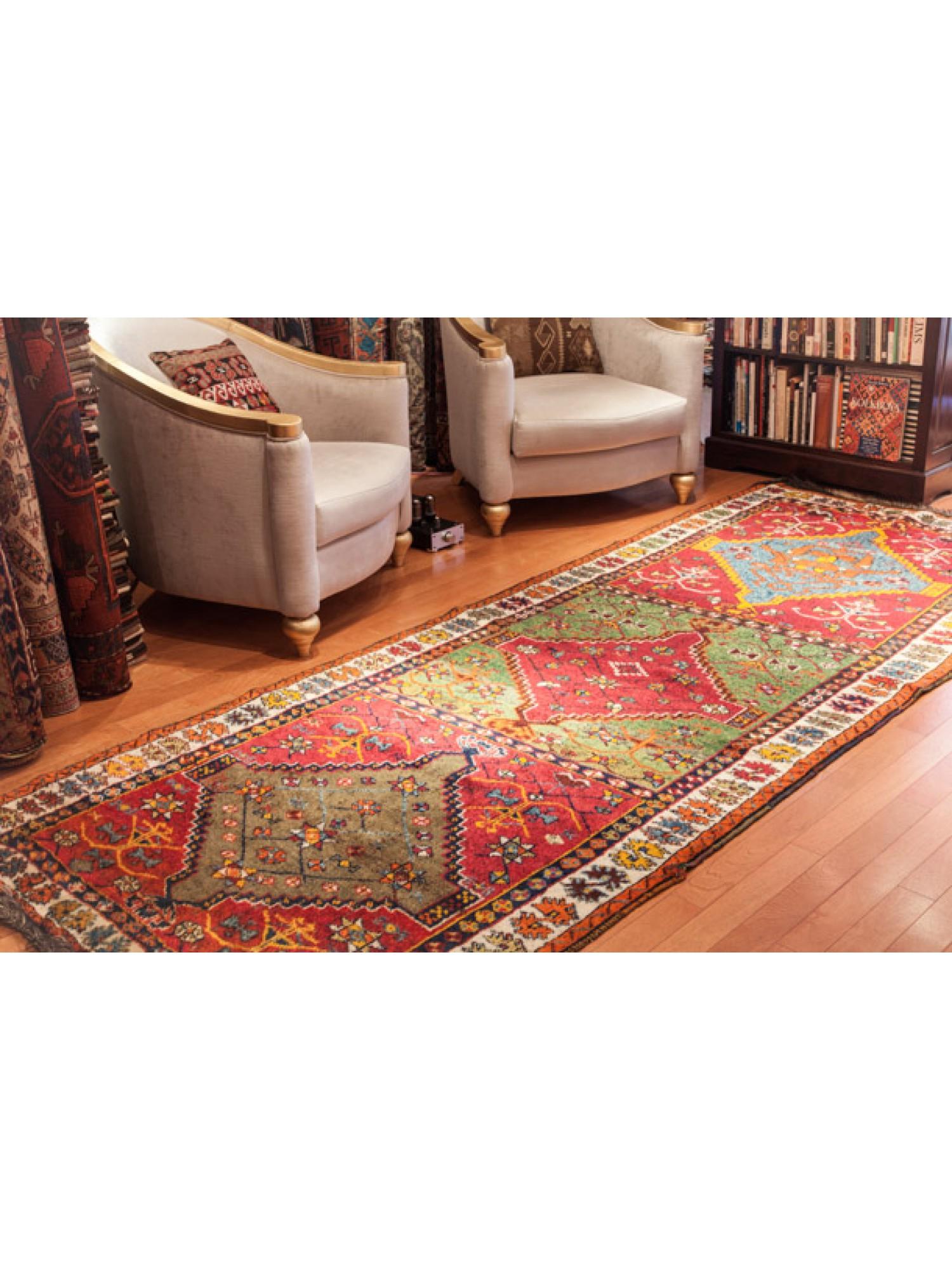 This is an Antique Kurdish Runner Rug from the Eastern Anatolia region with a rare and beautiful color composition.

Anatolian Kurdish rugs are handwoven rugs that originate from the Anatolian regions of Turkey and are associated with the Kurdish