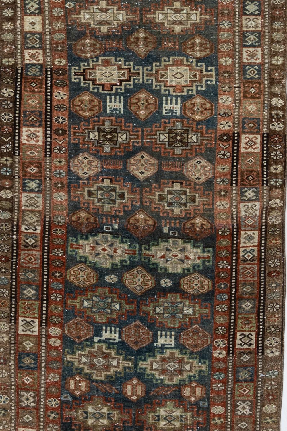 Age: late 19th century

Pile: Low

Wear Notes: 1

Material: Wool on wool

Vintage rugs are made by hand over the course of months, sometimes years. Their imperfections and wear are evidence of the hard working human hands that made them and