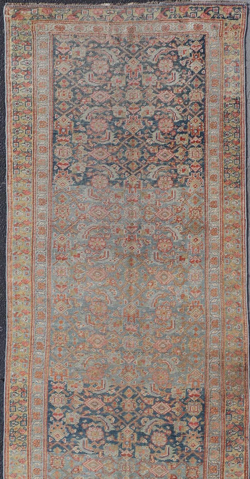 Hand-Knotted Antique Kurdish Runner with All over Design in Blue & Yellow Green For Sale