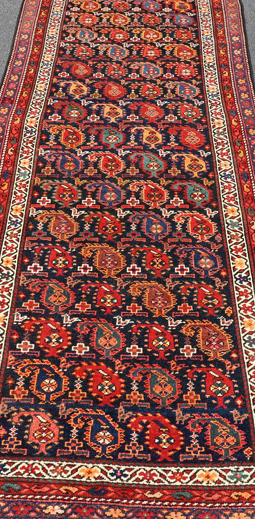 Persian Antique Kurdish Runner with All-Over Geometric Design in Charcoal Background For Sale