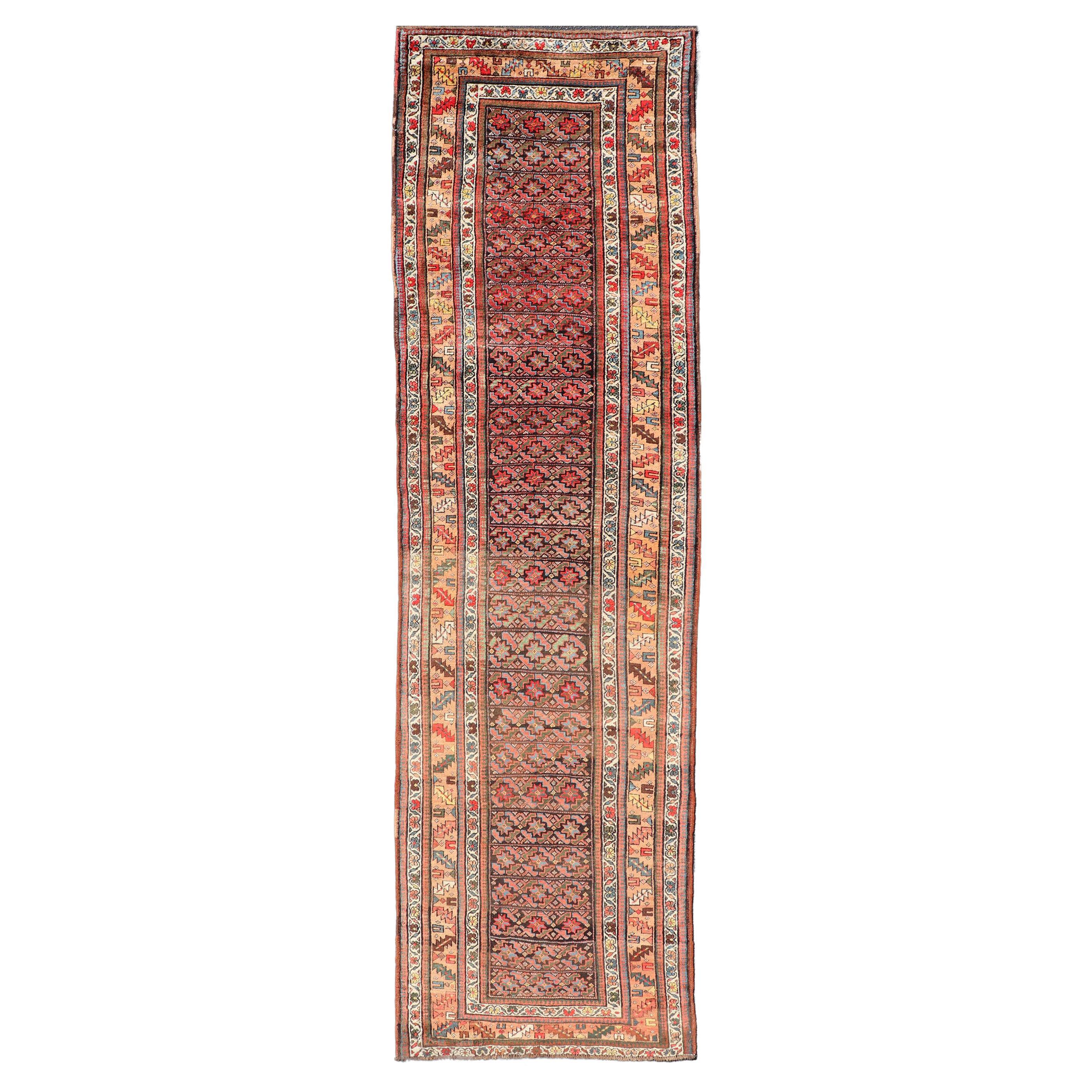 Antique Kurdish Runner with All-Over Geometric Design on a Blue Background For Sale