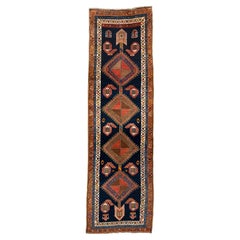 Antique Kurdish Runner with Bold Geometric Medallions on Deep Indigo Ground
