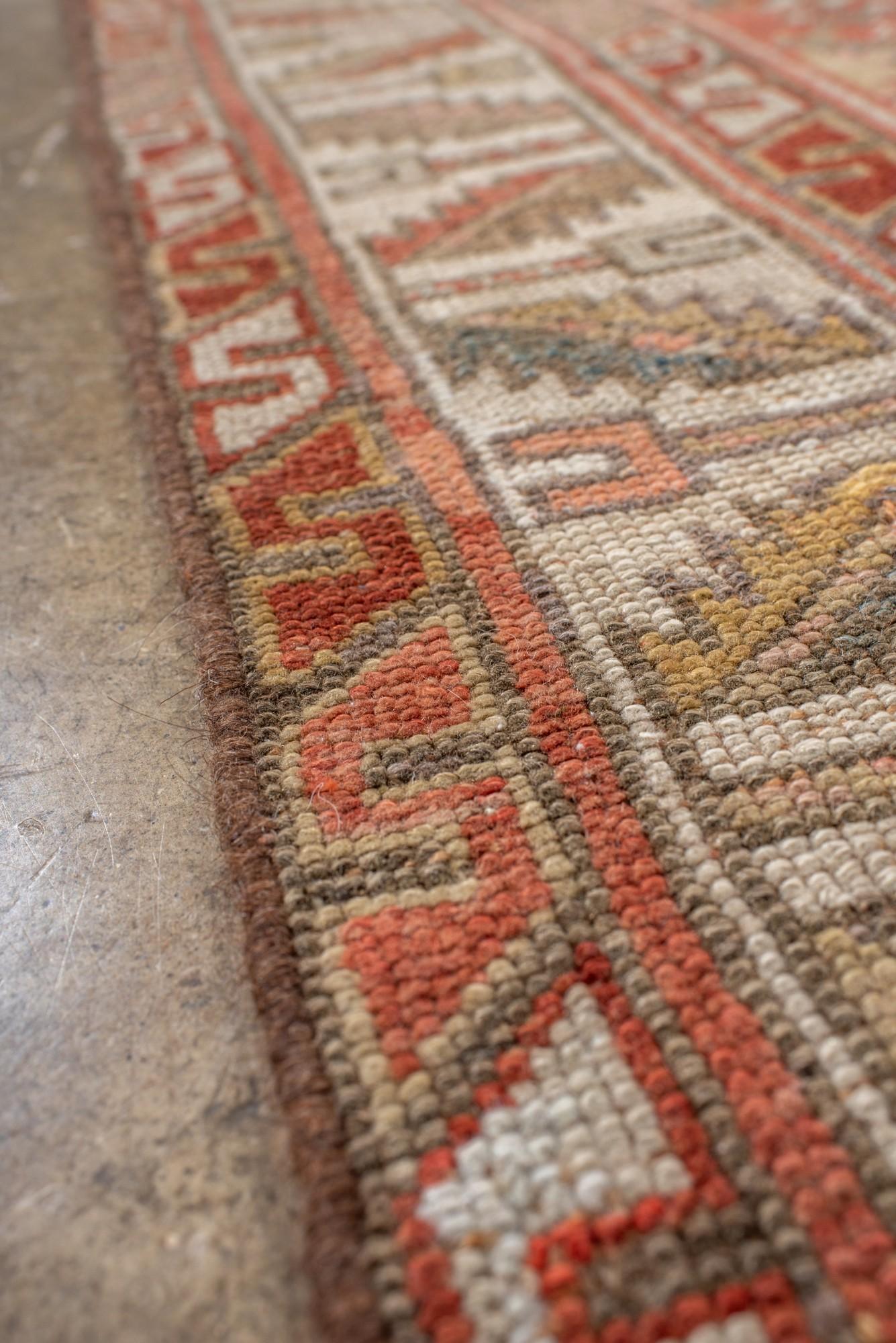 Antigua alfombra kurda con medallones geométricos Lana en venta