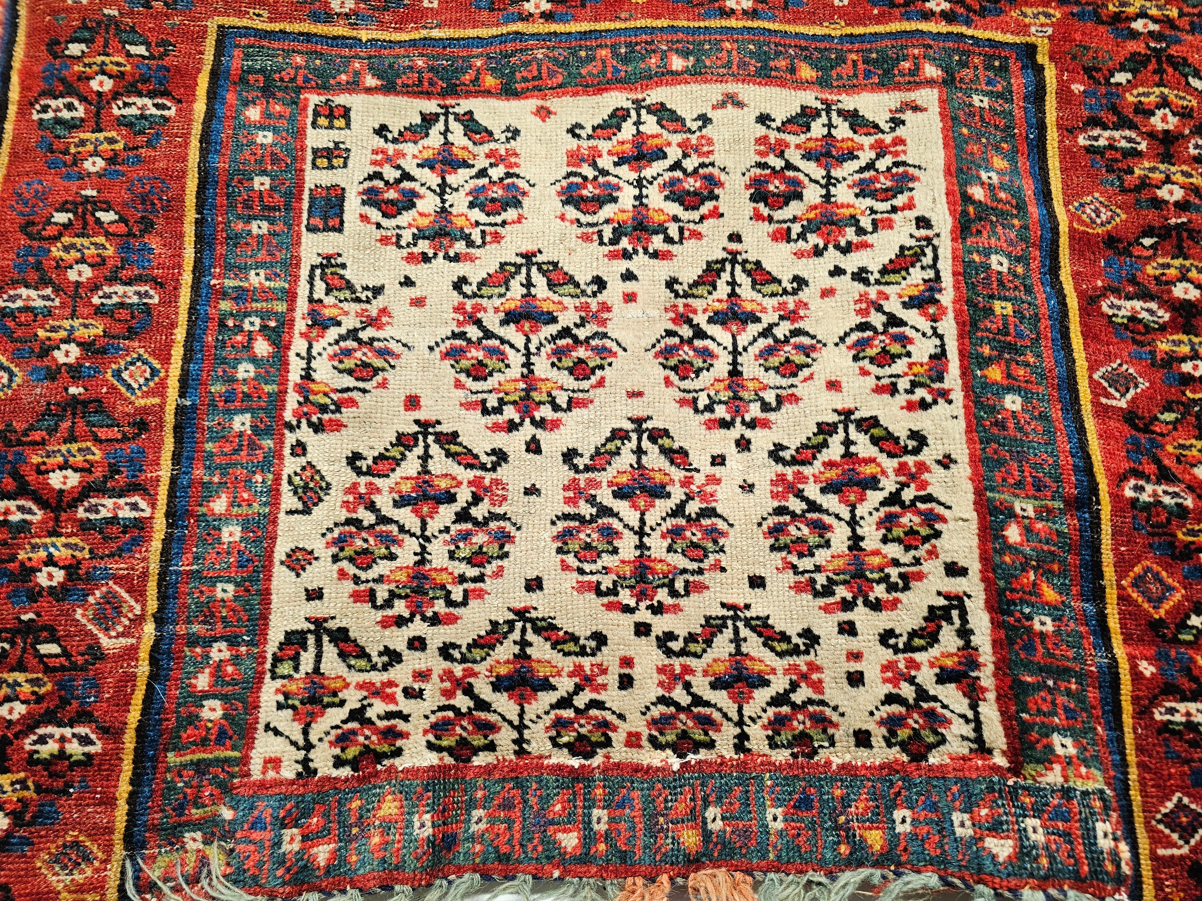 Vintage Persian Kurdish Saddle Blanket in Paisley Pattern in Ivory, Red, Green In Good Condition For Sale In Barrington, IL