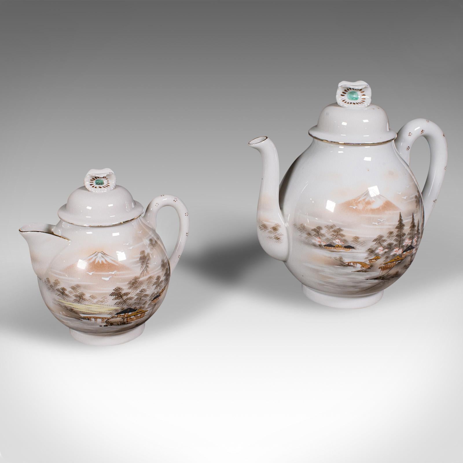 
This is an antique Kutani tea service. A Japanese, porcelain 6 person teapot and cups set, dating to the late Victorian period, circa 1900.

Superb Japanese tea service, with delicate craftsmanship and decorative finish
Presenting a desirable aged