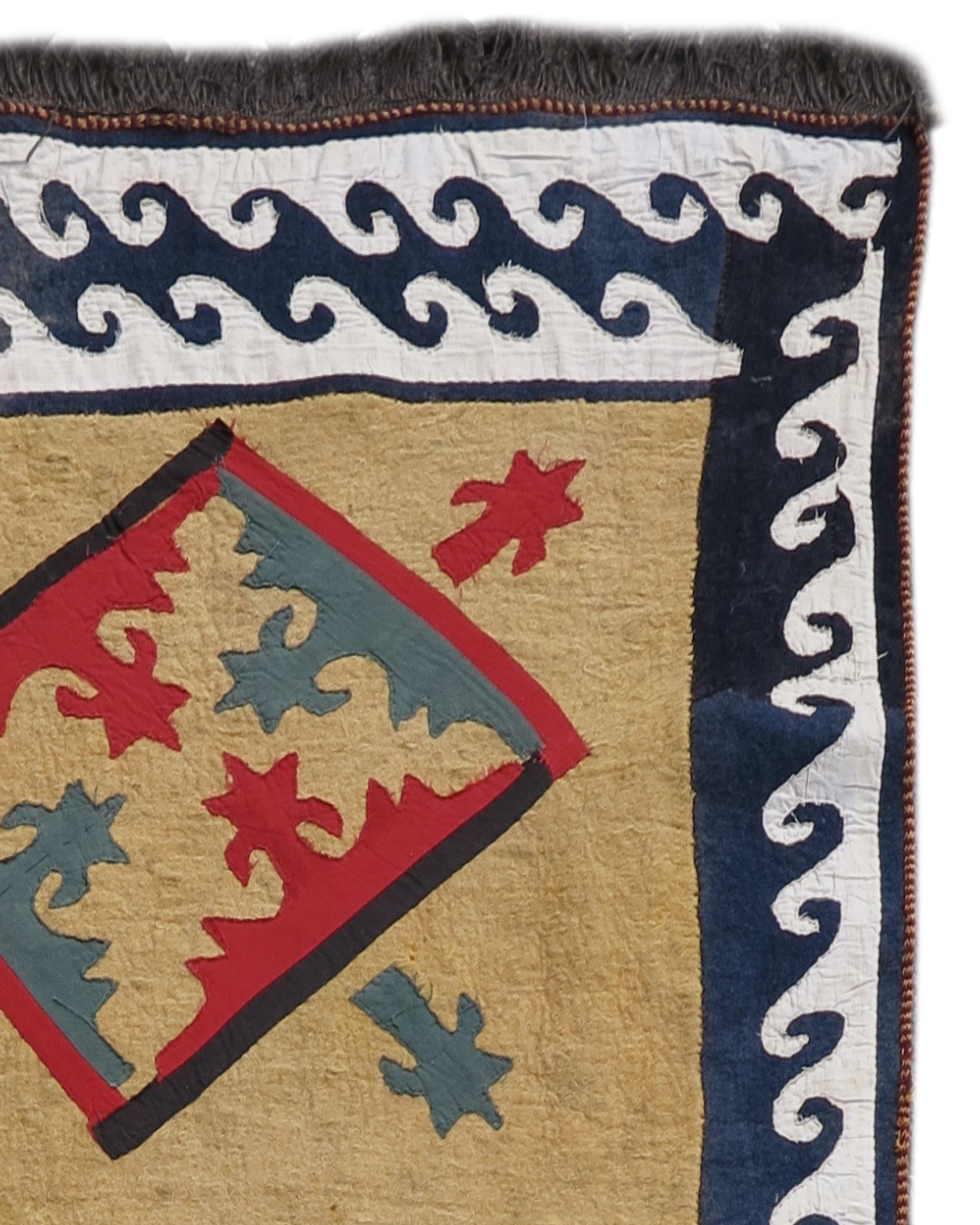 Antique Kyrgyz Felt and Applique Cover Rug, c. 1900

Additional Information:
Dimensions: 3'11