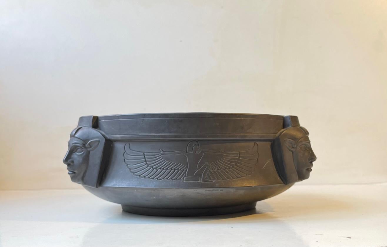 A very rare bowl by L. Hjorth, Bornholm, Denmark. Its made from black-burnt terracotta and decorated with 3 Pharaohs, images of Isis and hieroglyphs around its perimeter. It was made circa 1900-1910 on a very limited scale. Signed to its base: L.