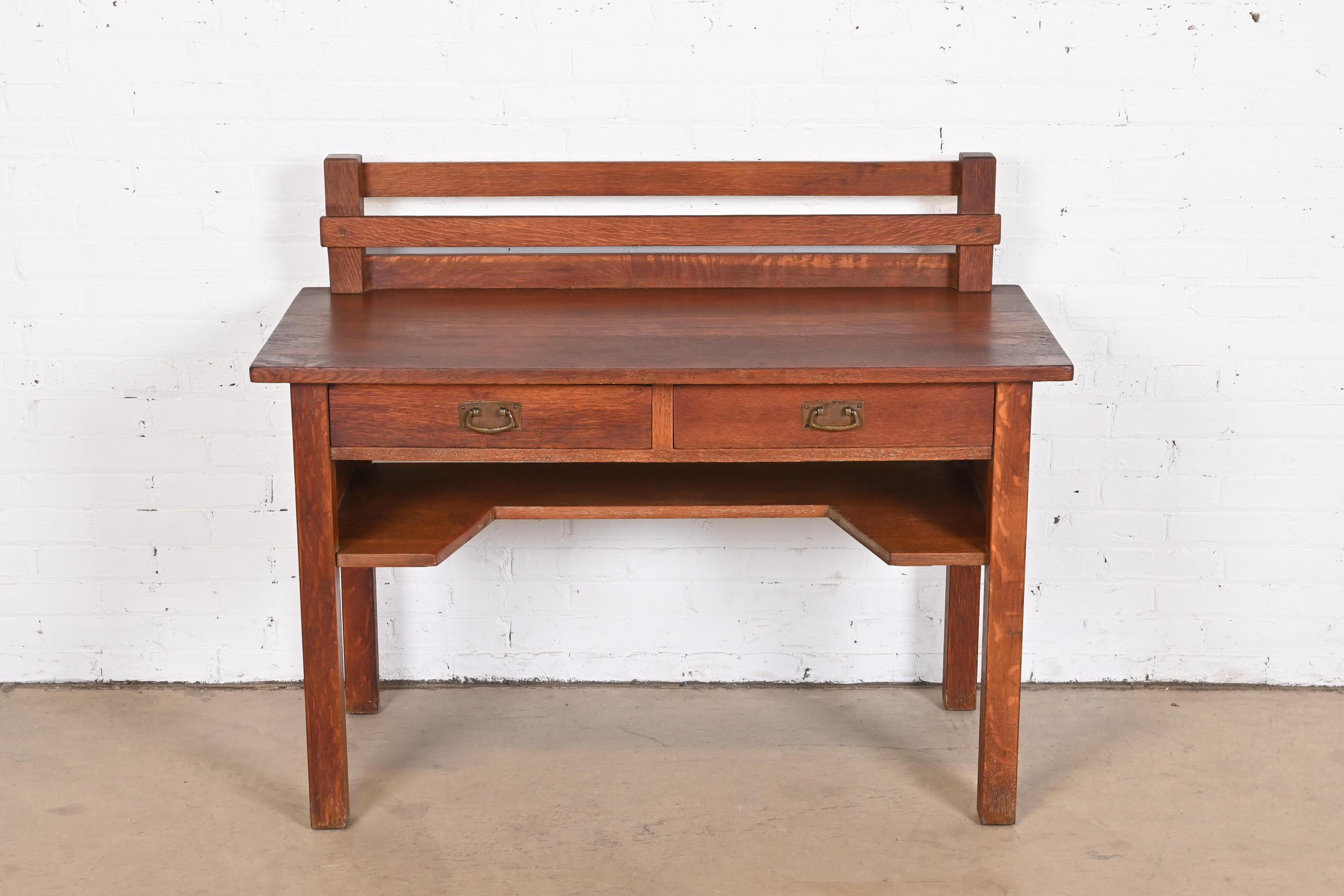 An exceptional antique Mission or Arts & Crafts writing desk

By L. & J.G. Stickley

USA, Circa 1900

Quarter sawn oak, with original hammered copper hardware.

Measures: 48