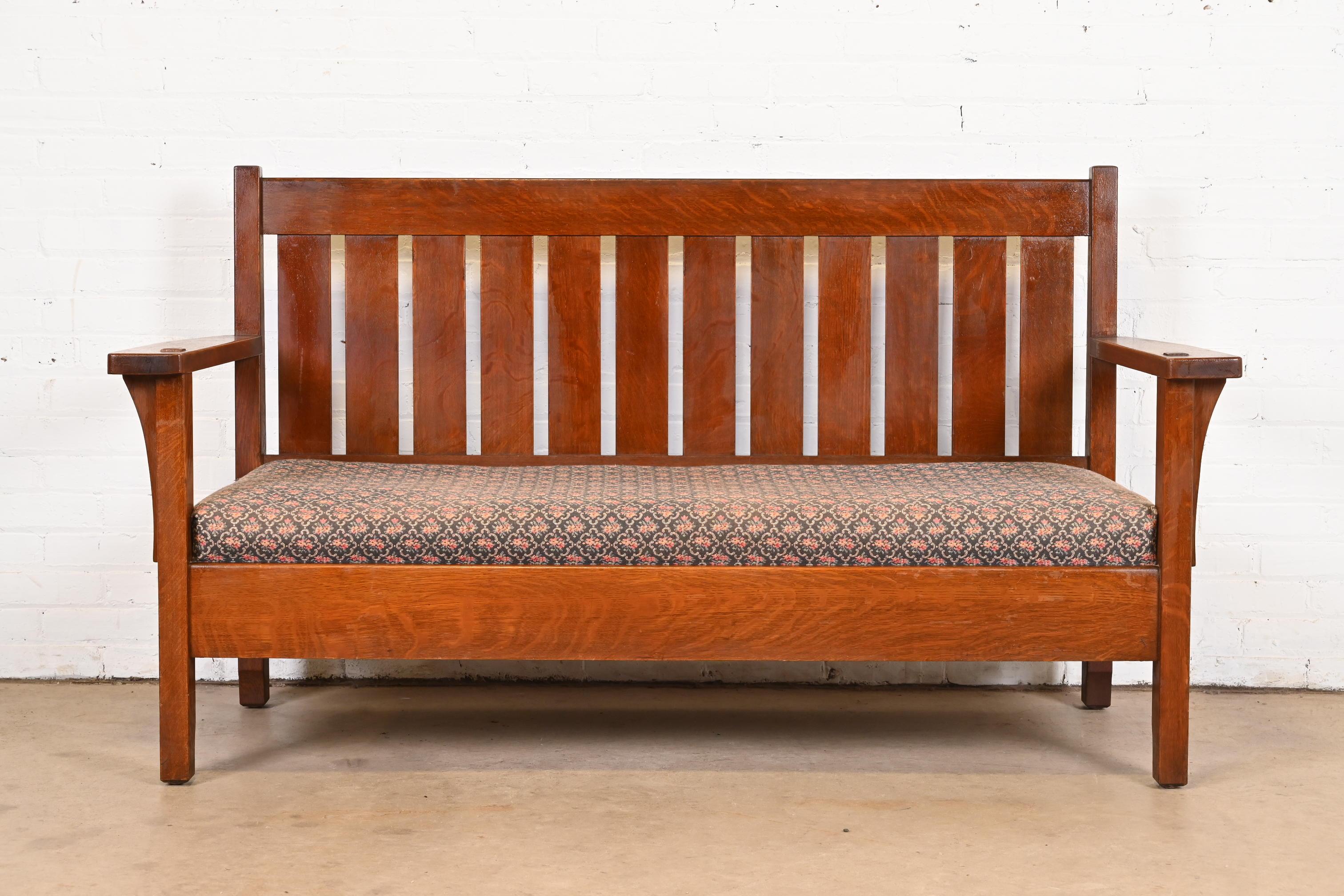 A beautiful Mission or Arts & Crafts loveseat, settee, or sofa

By L. & J.G. Stickley

USA, Circa 1900

Solid quarter sawn oak, with upholstered seat cushion.

Measures: 65