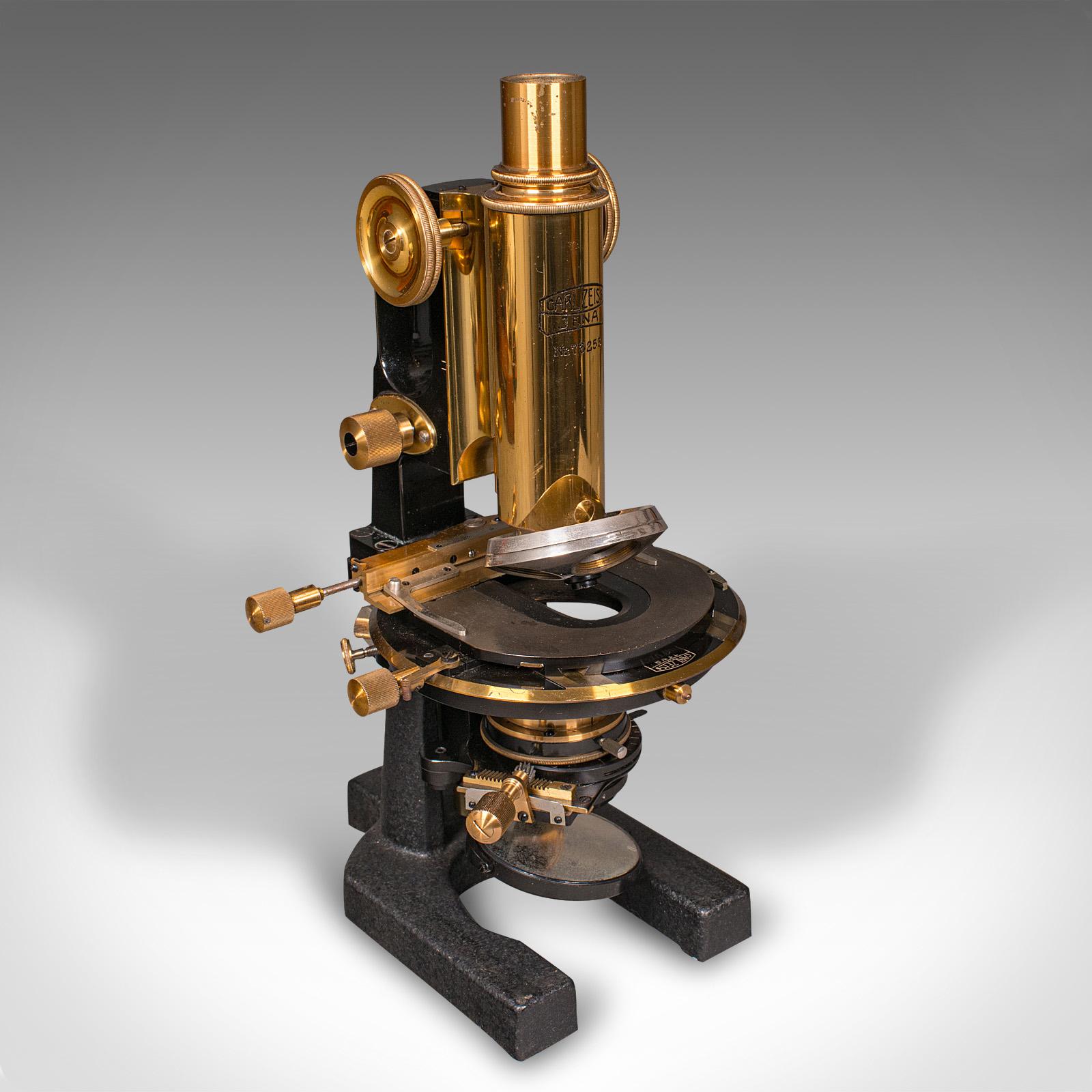 This is an antique laboratory microscope. A German, brass and enamelled metal scientific instrument by Carl Zeiss Jena, dating to the early 20th century, circa 1920.

Delightfully comprehensive cased microscope, from the renowned Carl Zeiss