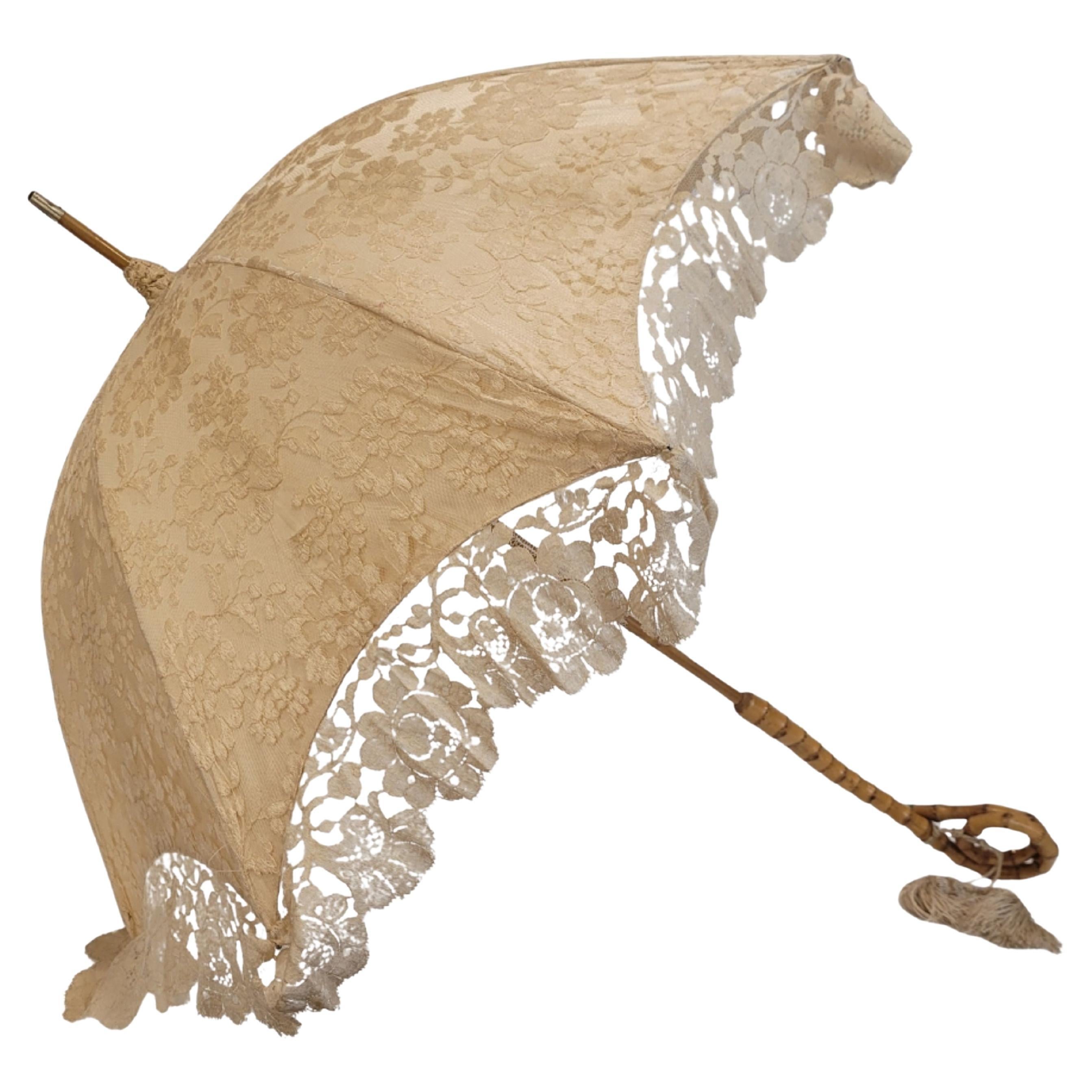 Antique lace and silk parasol or umbrella with bamboo pole For Sale