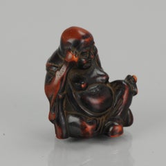 Antique Lacquer or Ceramic Netsuke Hotei with Fan 19th Century, Japanese, Japan