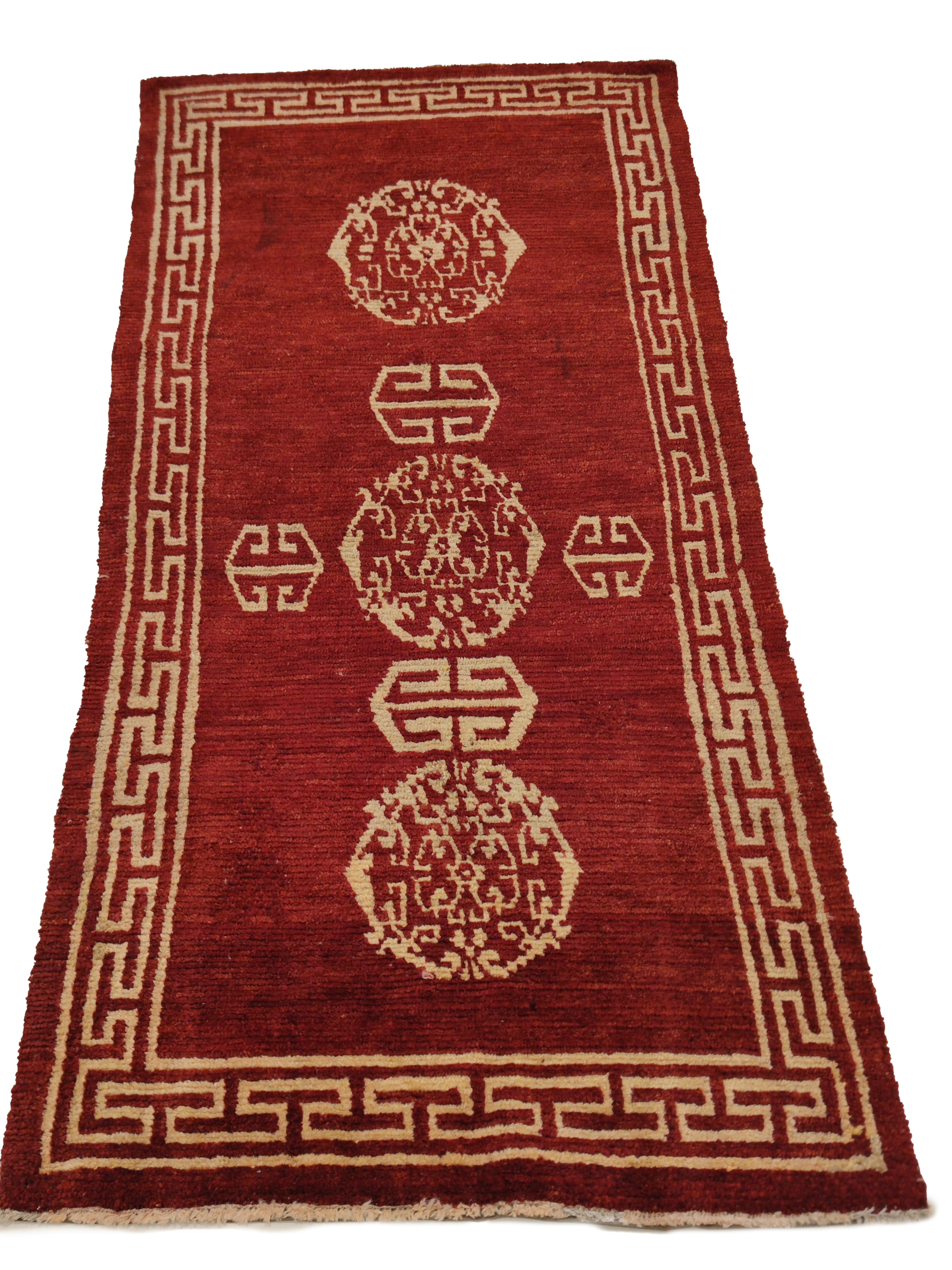 Hand-Knotted Antique Lacquer Red Tibetan Khaden Meditation Rug For Sale