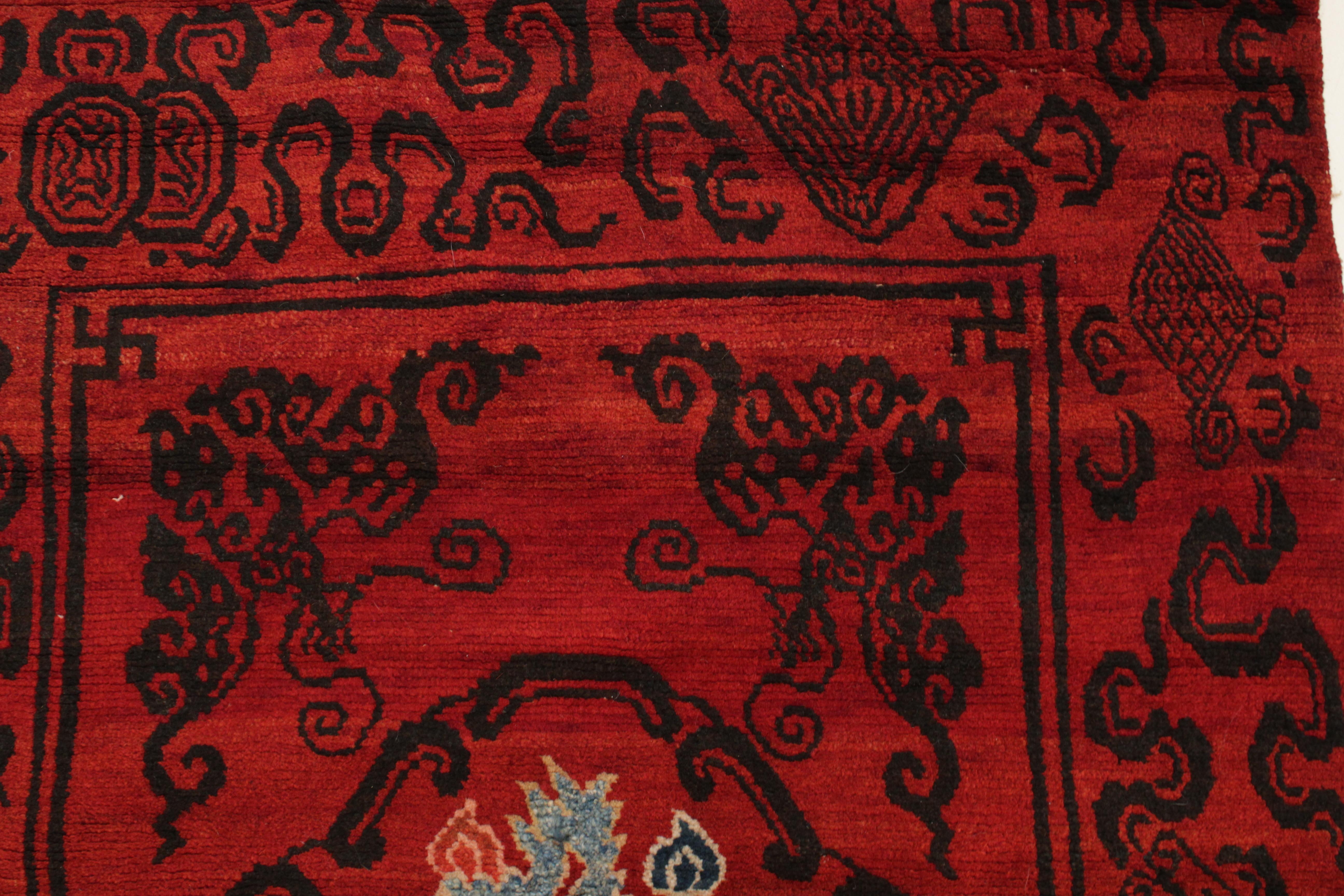 20th Century Antique Lacquer Red Tibetan Khaden Rug with Lotus Flowers and Cloud Bands For Sale