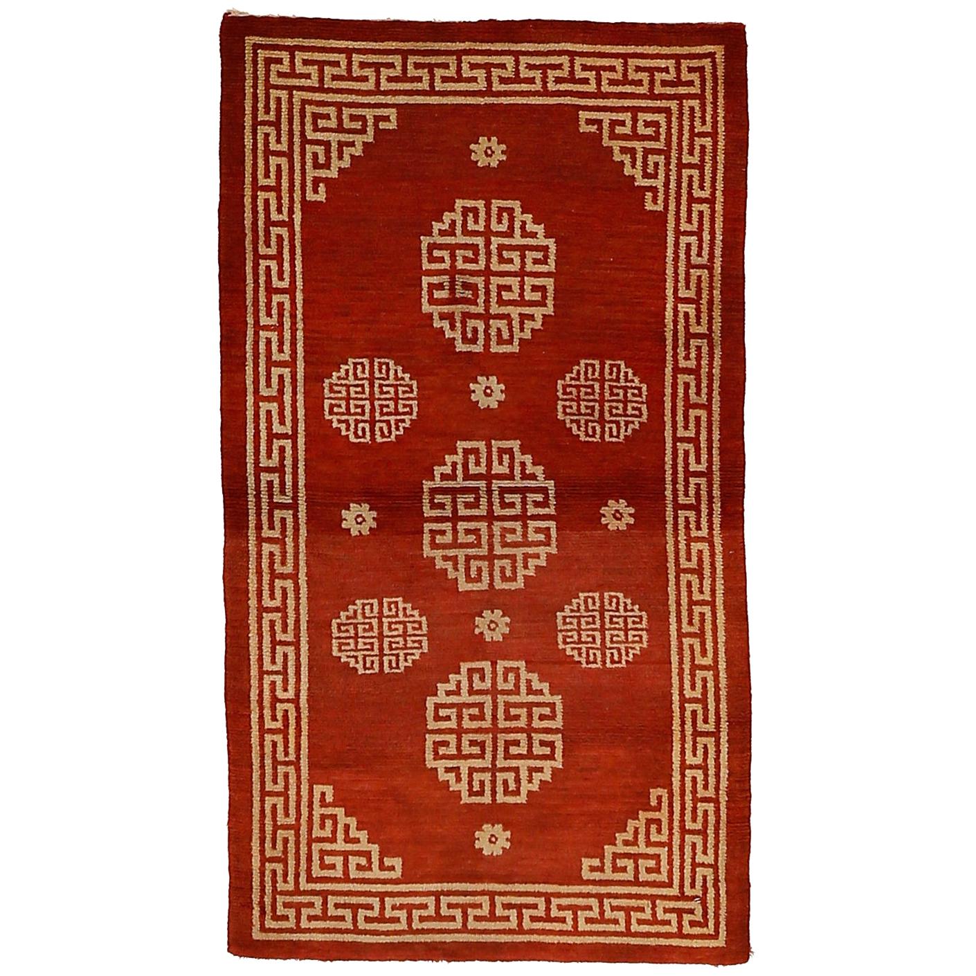 Antique Lacquer Red Tibetan Rug with Geometric Design For Sale