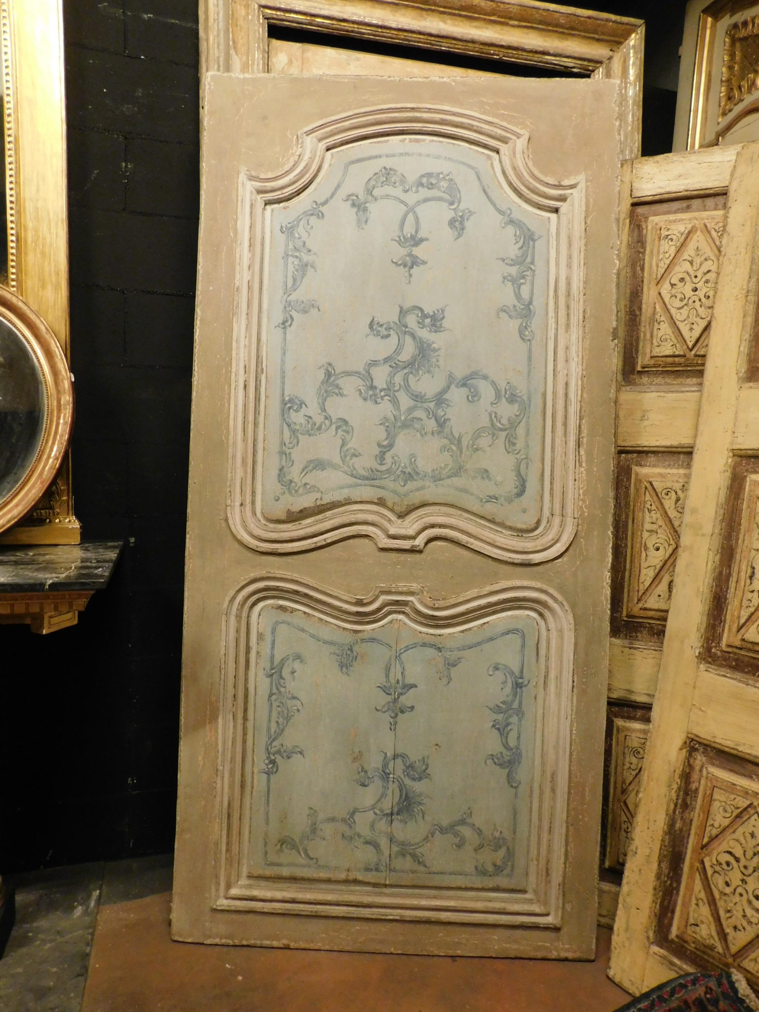 Antique lacquered and hand painted door, blue and gray colors, the same on both sides, very beautiful with carved molure and painted panels with typical decoration of the century, built and painted entirely by hand in the early '700 by chance of
