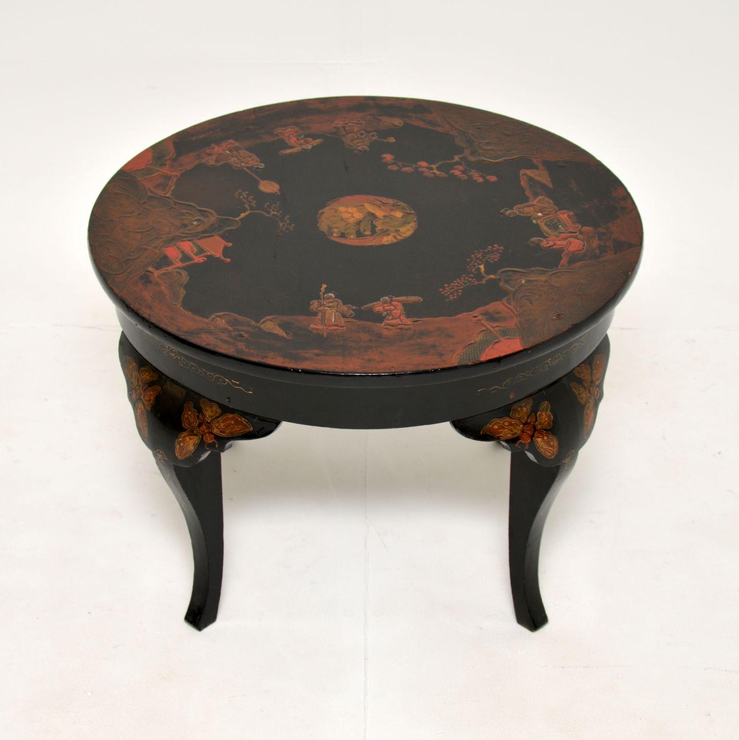 A beautiful lacquered chinoiserie coffee table in the antique Chinese style. This was made in England, it dates from around the 1920-30’s.

It is a very useful size and is of wonderful quality. The black lacquered finish is decorated with red and