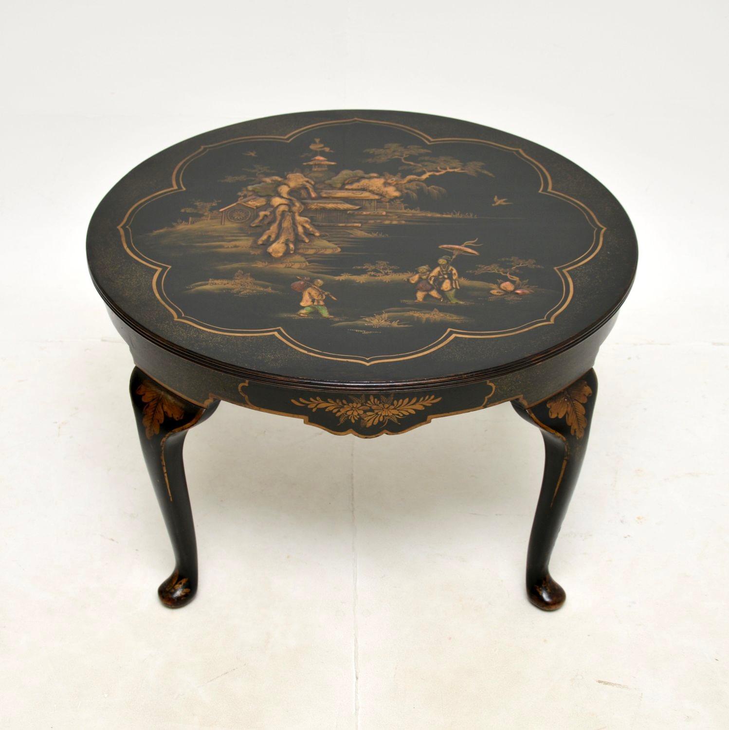 An absolutely stunning antique lacquered chinoiserie coffee table. This was made in England, it dates from around the 1920’s.

It is of extremely fine quality, with gorgeous lacquered decorations in the classic oriental style. It is a very useful