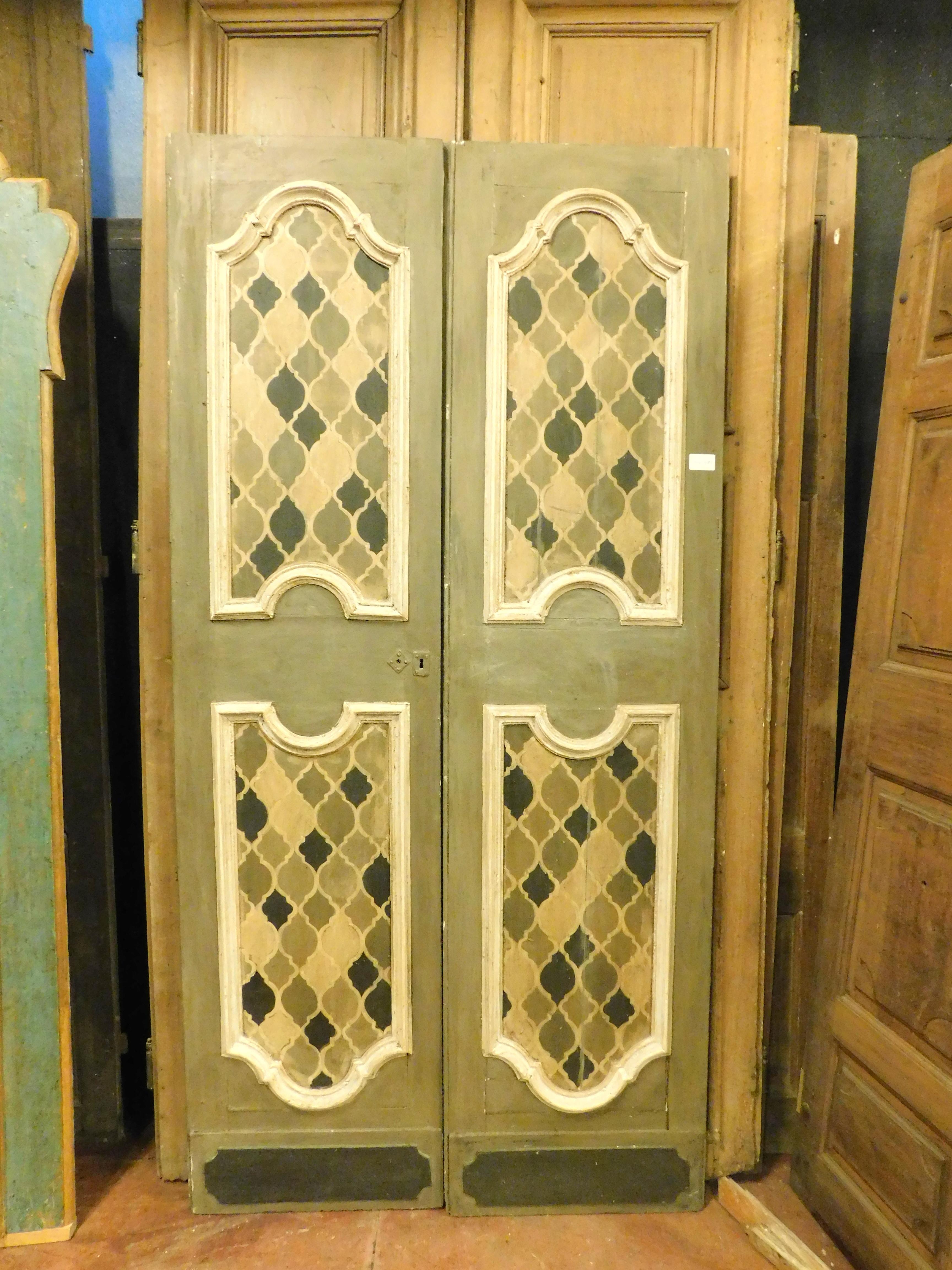Antique lacquered and hand painted door, built at the beginning of the 18th century for a house in Italy in Florence, soft and elegant colors with geometric hand-painted in various colors on brown, double door without frame, to hang on the wall. It