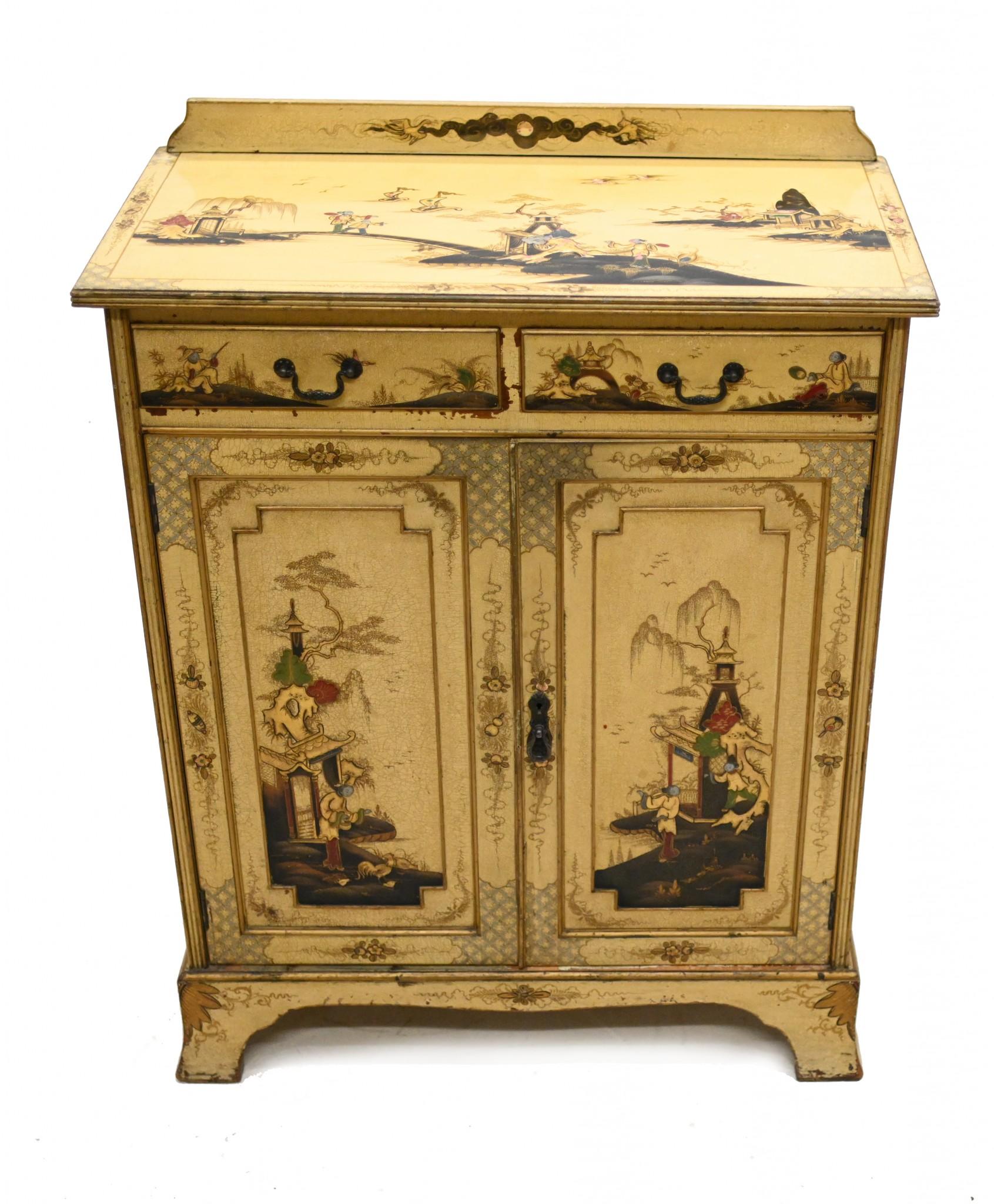 Glorious antique lacquered side cabinet in the Chinese manner with intricate Chinoiserie
Off white cream colour with craquelure and antiqued finish
Craquelure on a painting is the network, or pattern, of cracks that develops across the surface as