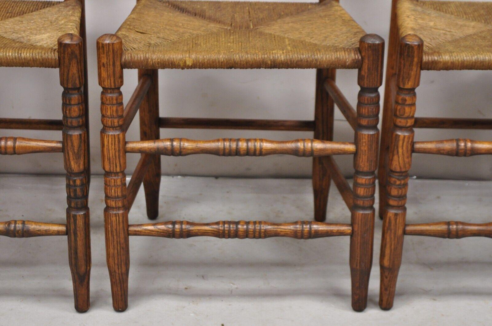 Antique Ladderback Primitive Rustic Oak Wood Rush Seat Dining Chairs - Set of 4 For Sale 1