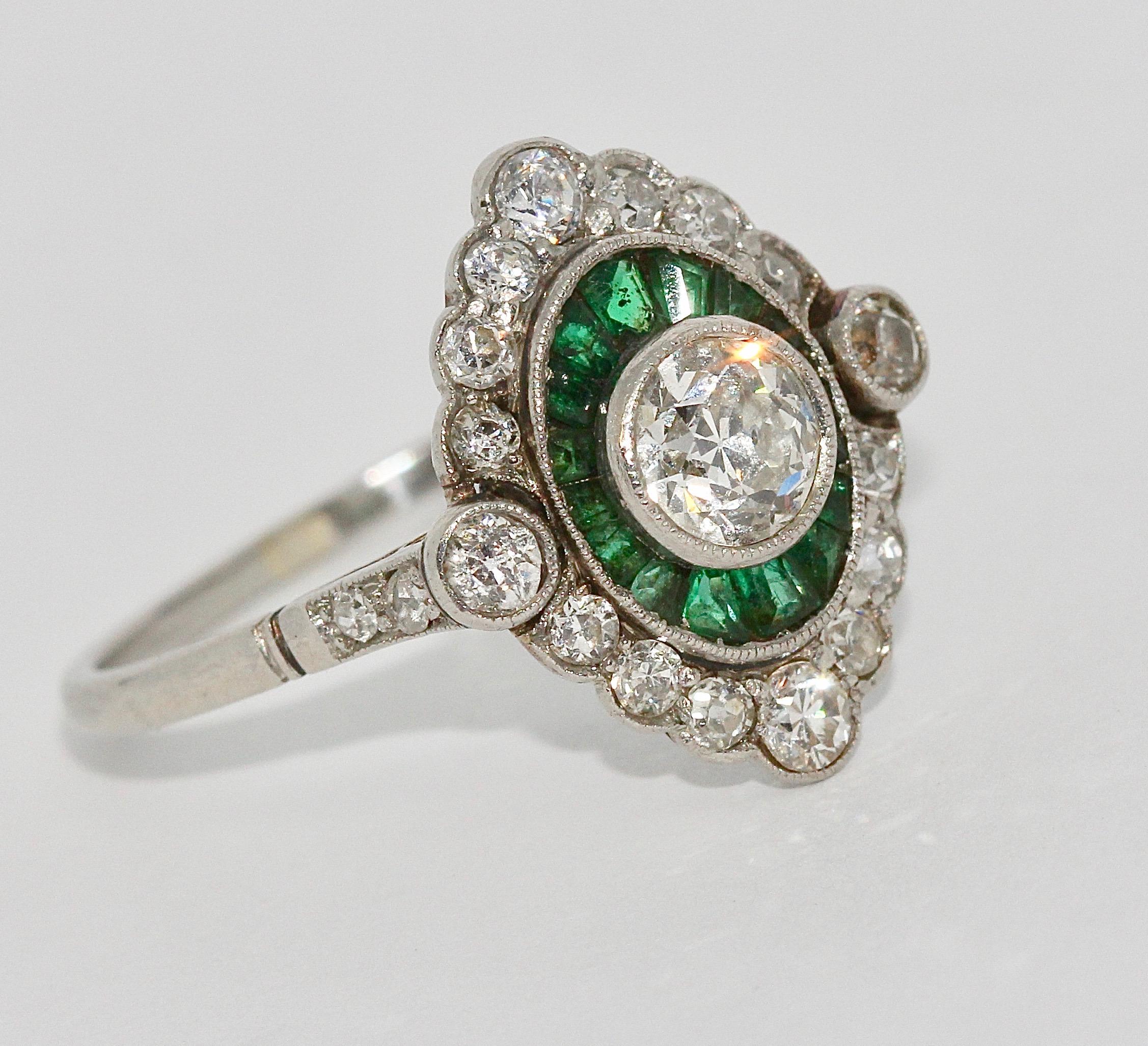 Antique Ladies Art Deco Style Gold Ring with Diamonds and Emeralds.


Platinum or white gold. Large solitaire has approx. 0.45 carat.

US ring size about 7 3/4.

Including certificate of authenticity.