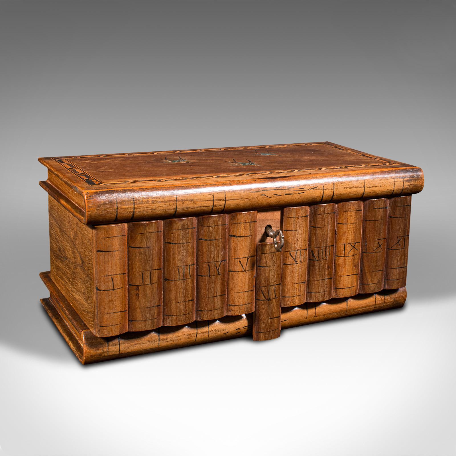 This is an antique ladies vanity box. An Italian, olive wood keepsake or jewellery box, dating to the early 20th century, circa 1920.

Unusual form with a fascinating hidden lock mechanism
Displaying a desirable aged patina and in good order
Select