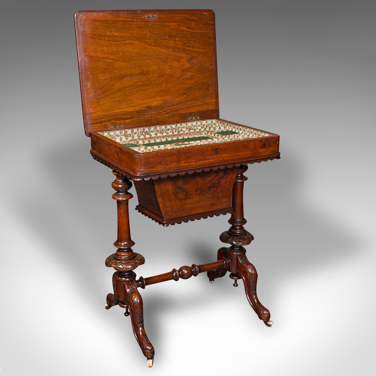 This is an antique ladies work table. An English, burr walnut ladies sewing table, dating to the early Victorian period, circa 1850.

Eye-catching form and finish, with great colour
Displaying a desirable aged patina and in good order
Burr walnut