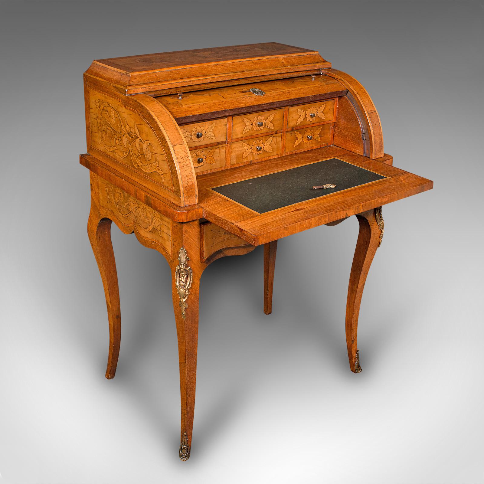 This is an antique ladies writing desk. A French, walnut decorative bonheur du jour, dating to the late Victorian period, circa 1900.

Beautiful craftsmanship with superb colour and form
Displaying a desirable aged patina and in very good