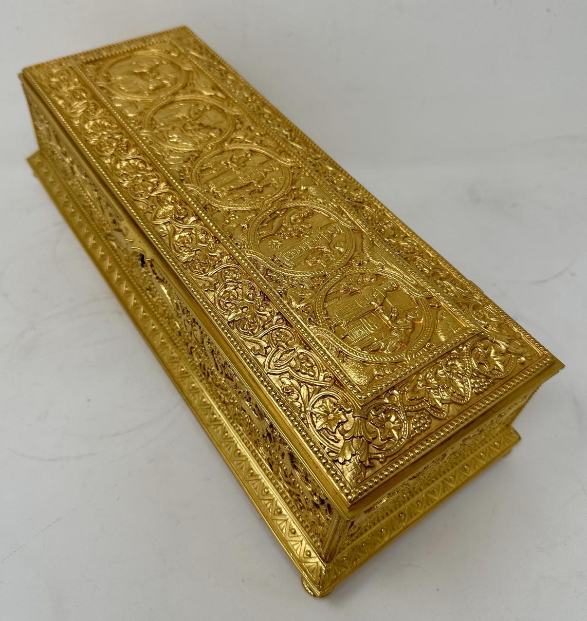 Absolutely stunning French chisel cast Medieval revival Lady's Jewlery Casket of Museum quality, made during the third quarter of the Nineteenth Century. Retailed by Maison Boissier Paris France. 
The slightly cushioned wide hinged lid is decorated