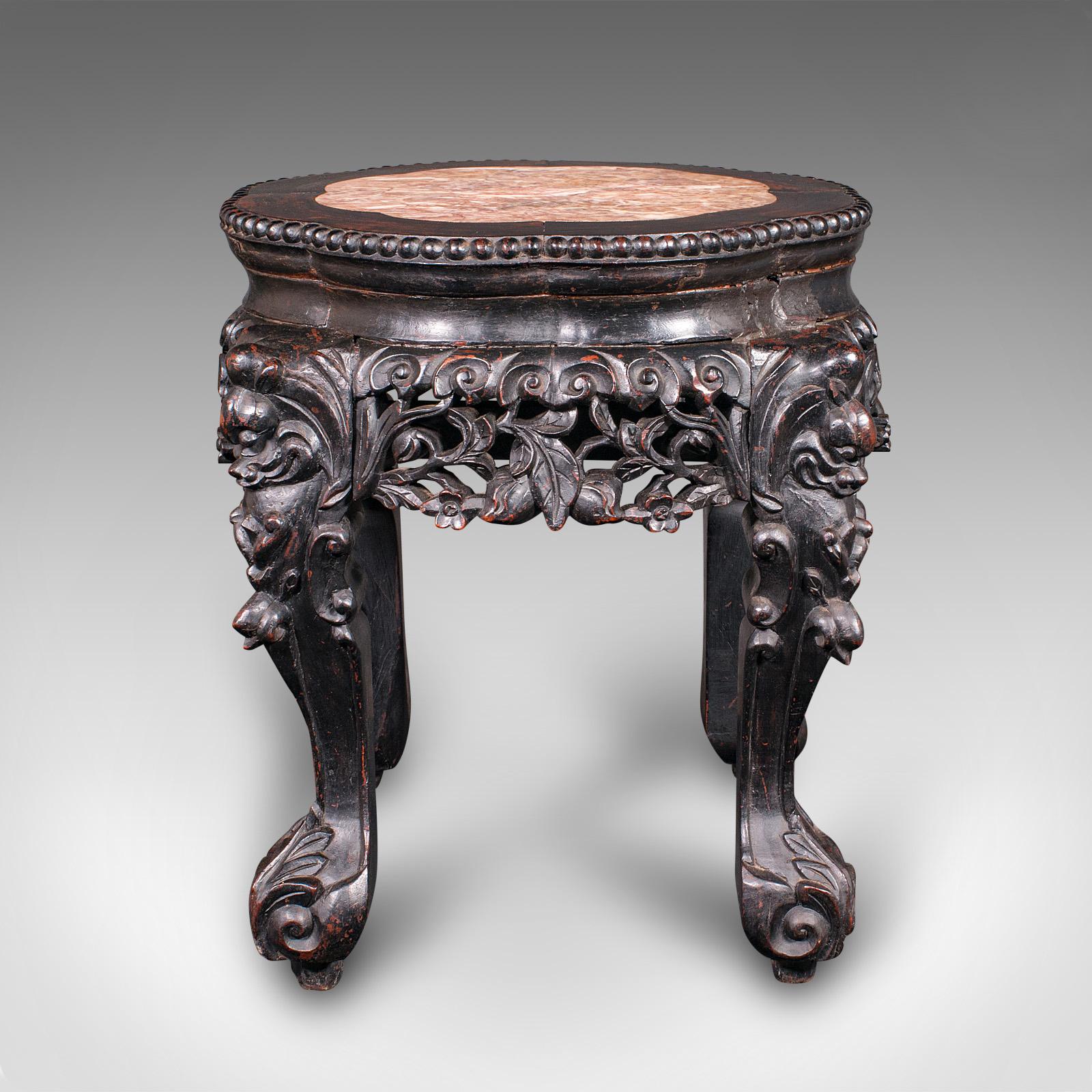 This is an antique lamp table. An English, ebonised mahogany occasional stool, side table or wine stand, dating to the early Victorian period, circa 1850. A richly toned and beautifully carved piece, offering superb decorative appeal.

Fascinating