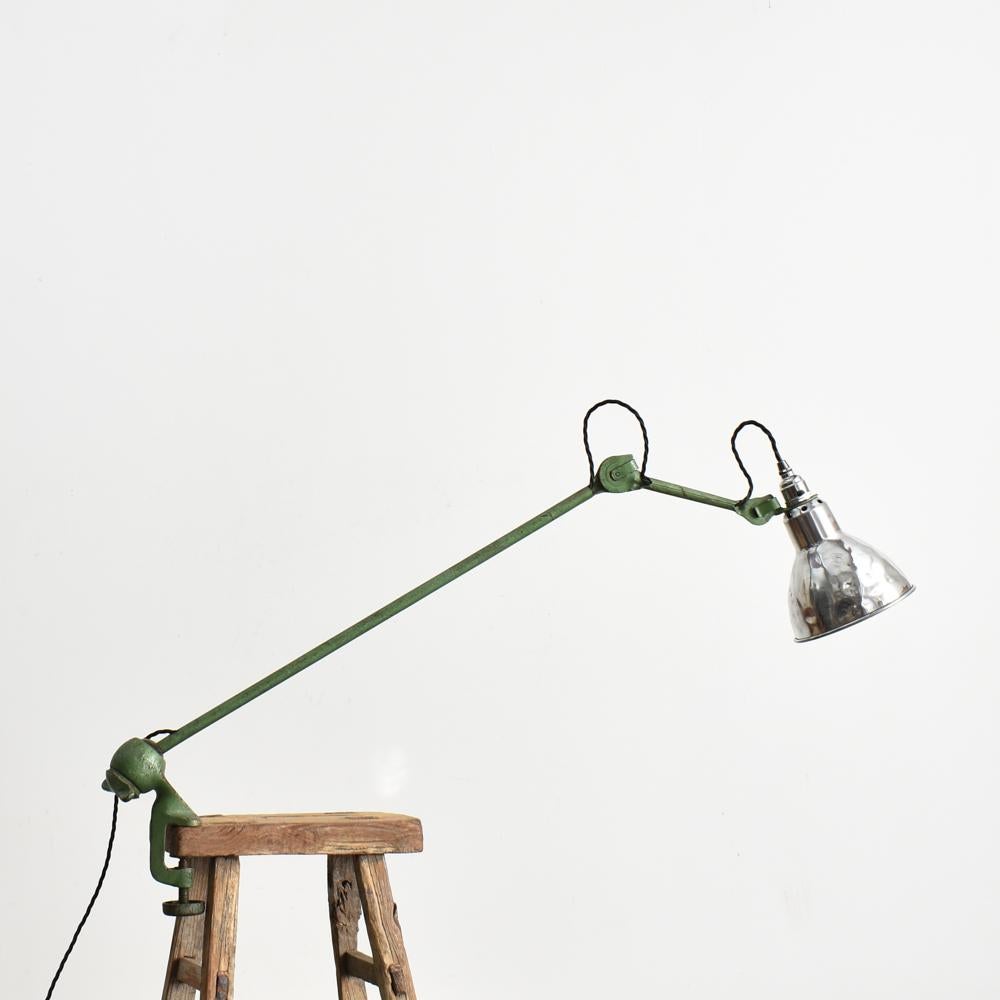 Lampe Gras Model 201 by Bernard Albin Gras – A

A Lampe Gras Model 201 by Bernard Albin Gras for Ravel Clamart

A design classic table lamp with a clamp fixing and ball and socket joint. The lamp is in its original green paint and original aluminium