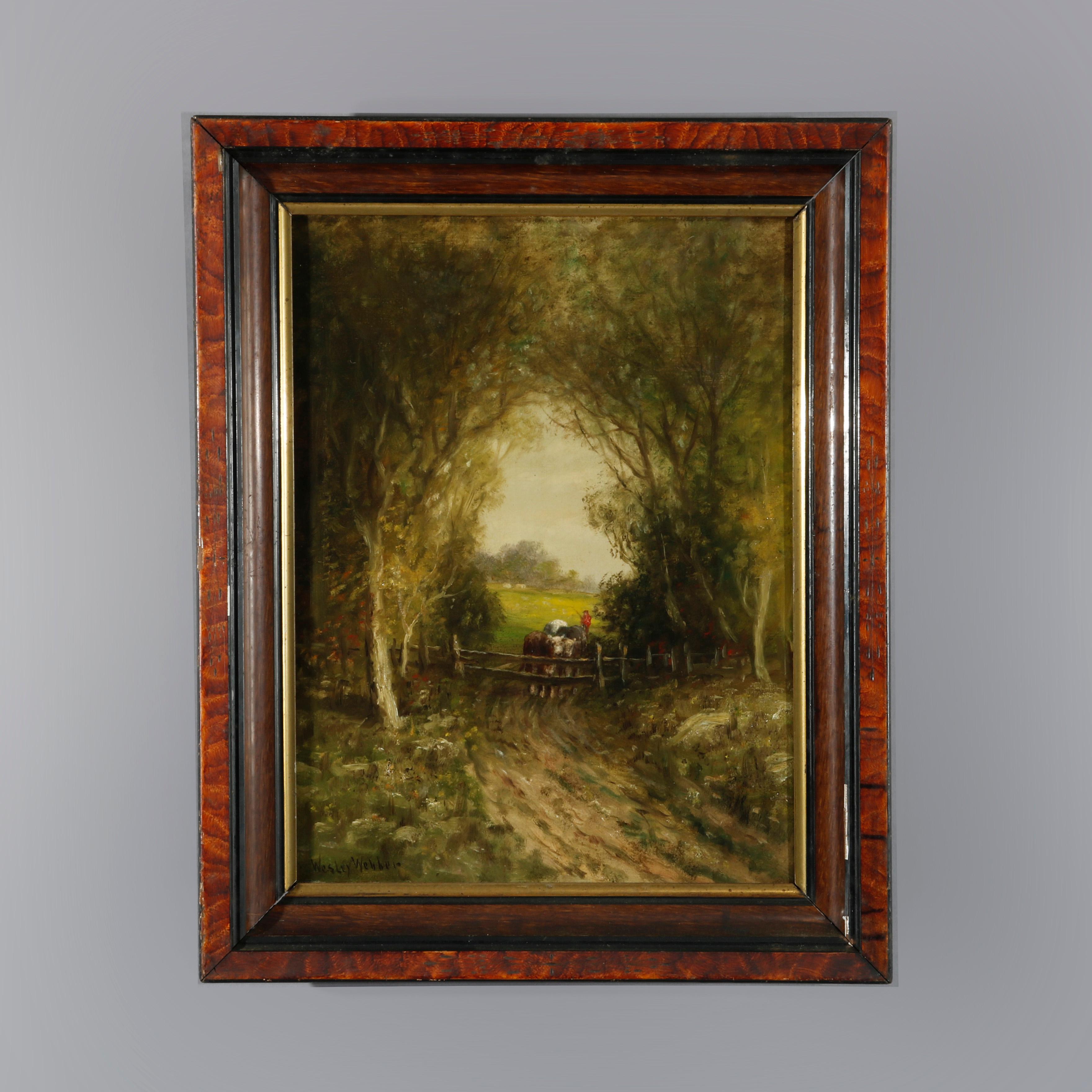 An antique landscape painting by Wesley Webber offers oil on canvas pasture scene with tree lined path, fence and cattle, artist signed lower left, seated in giltwood frame, relined, 19th century

Measures - 25''H x 20''W x 3.5''D; sight 16.25'' x