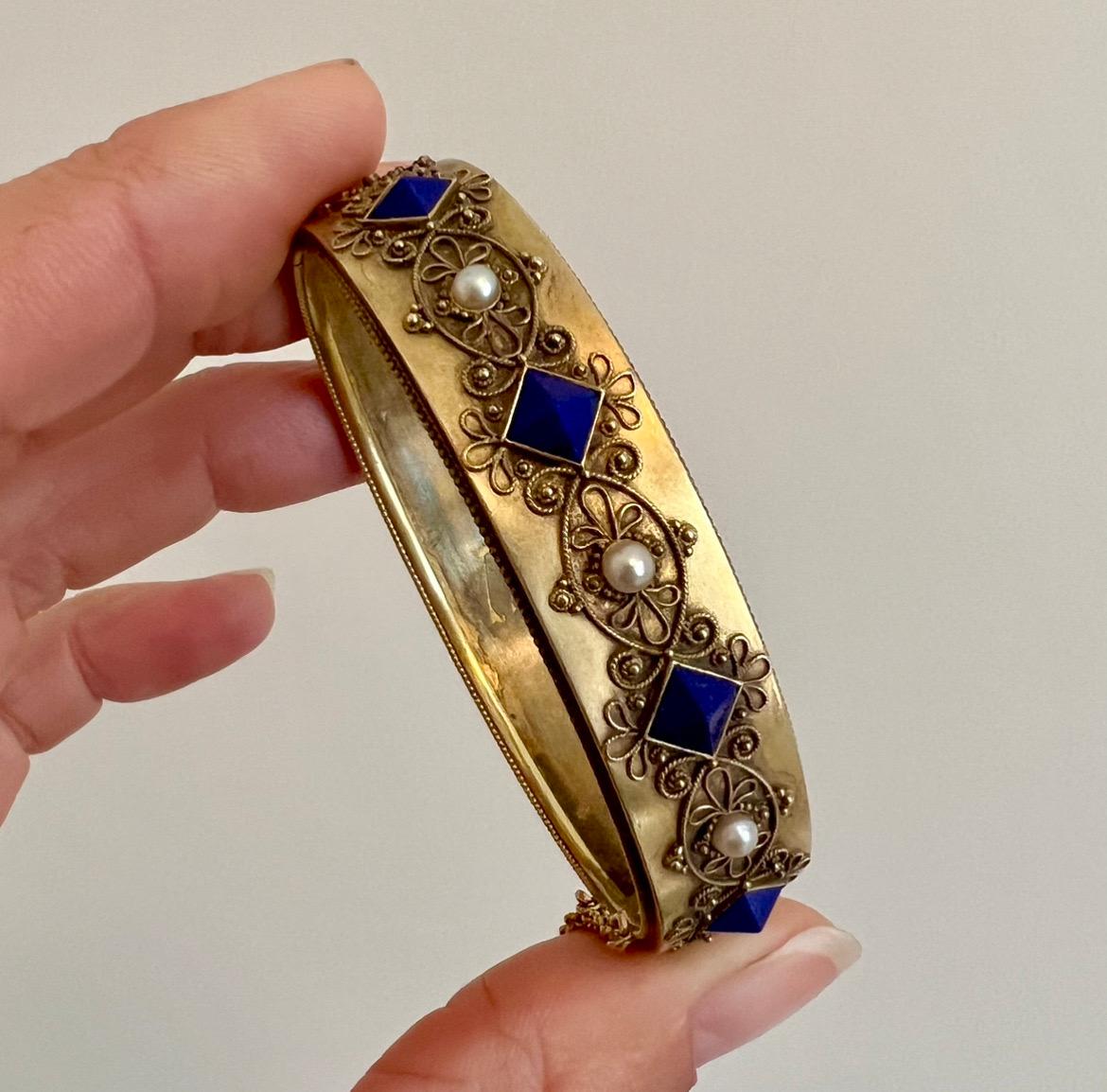 This antique bracelet, crafted in 14k gold, is a stunning example of late 19th-century jewelry design, dating back to circa 1880. The bracelet showcases a harmonious blend of luxurious materials and intricate craftsmanship, making it a timeless