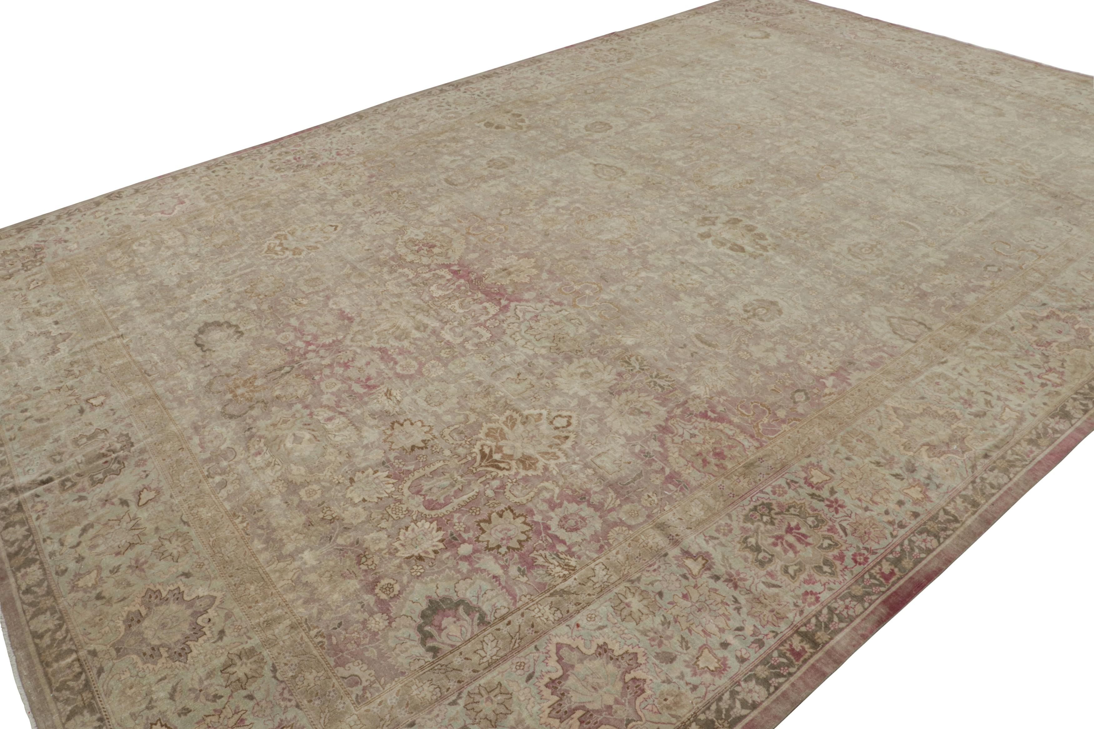 Hand-knotted in wool, this 12x17 antique Larestan rug, originating from India, circa 1920-1930, is likely to be inspired by works of the same Persian region and its workshops. 

On the Design: 

Featuring a beige-brown with a raspberry field, this