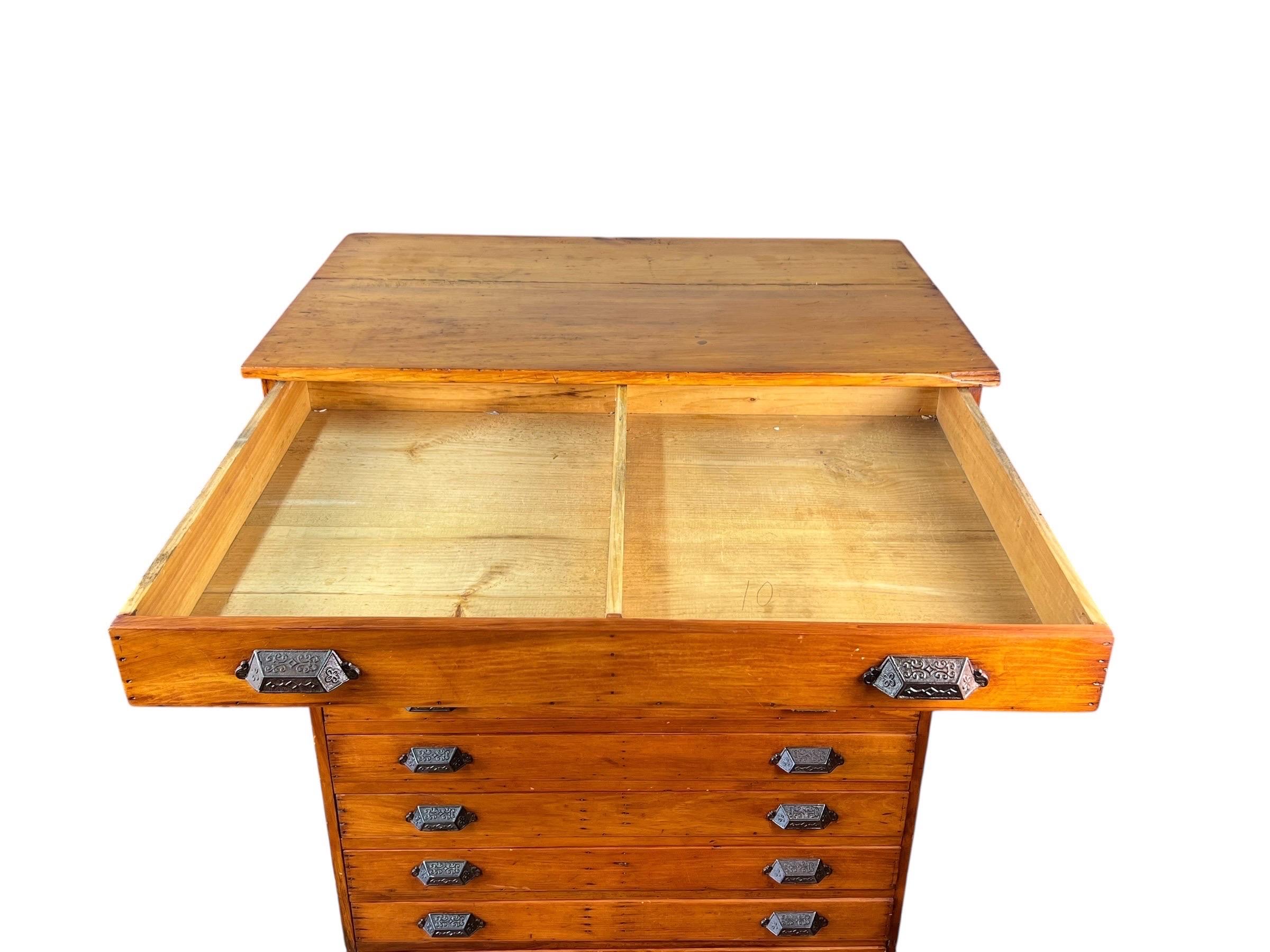For sale is this very nice antique 10 Drawer pine Map File Cabinet. The cabinet has square nails and very nice cast iron pulls