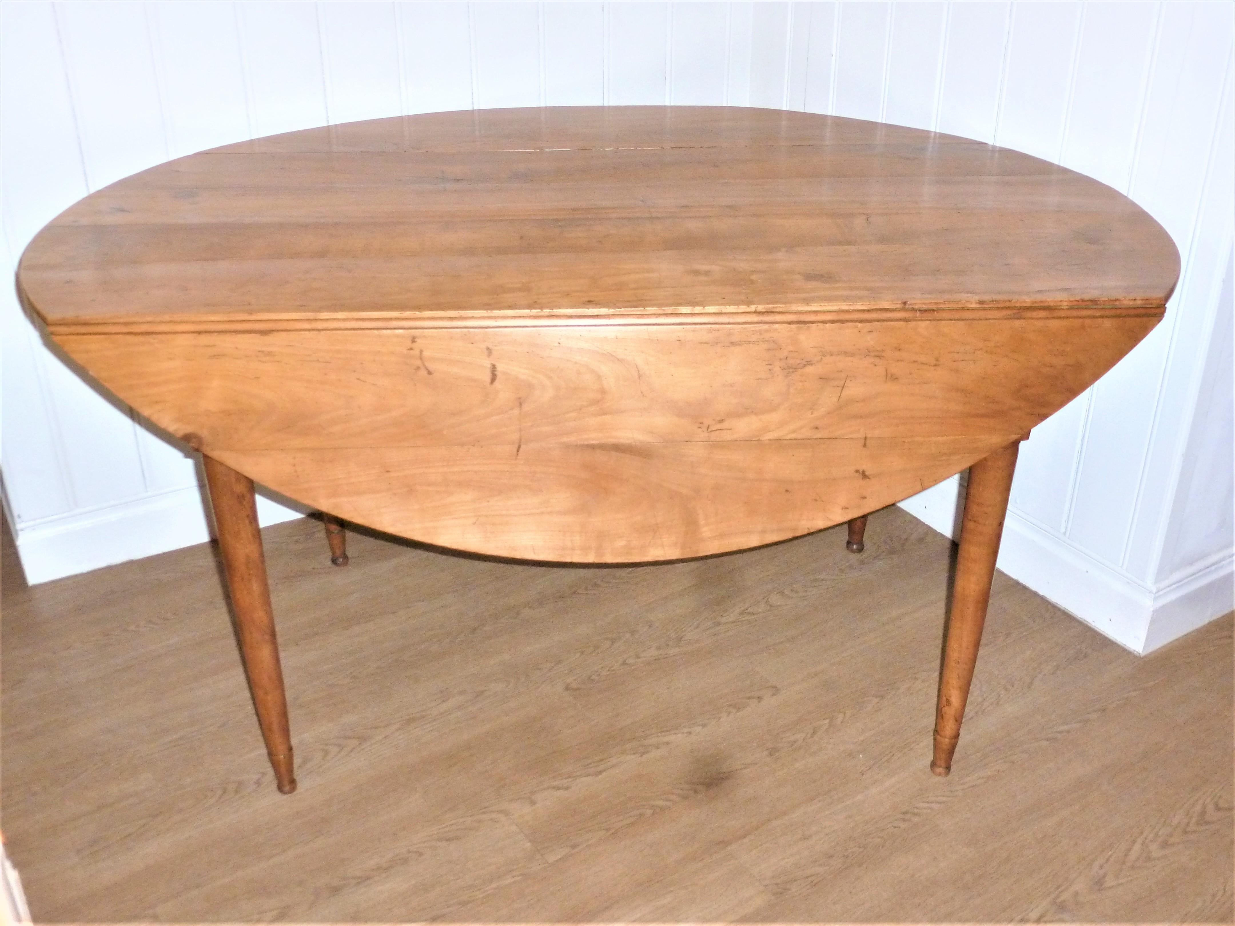 French Provincial Antique 18th Century French Oval Drop-Leaf Cherry Dining Table on Louis XVI Legs For Sale