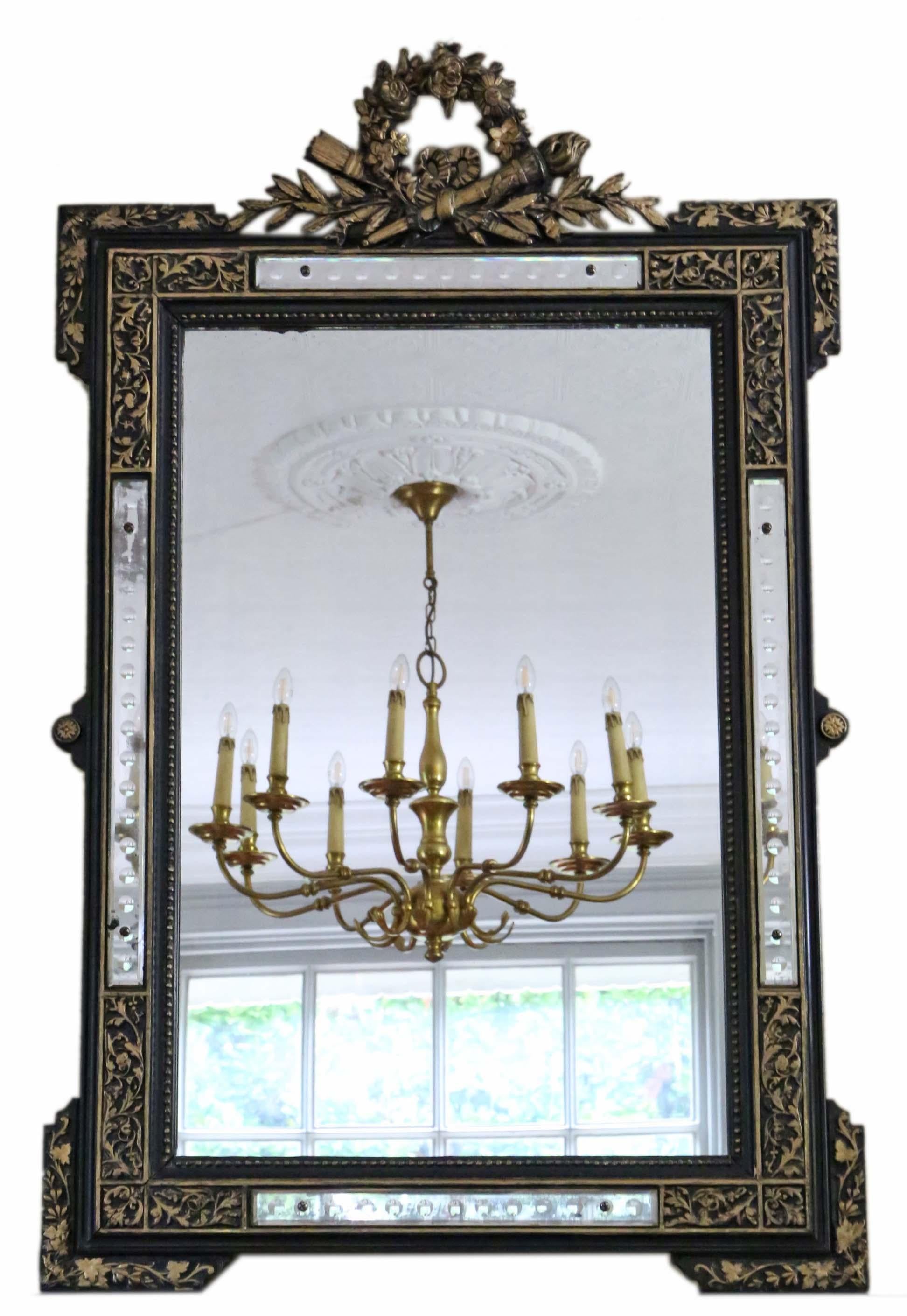 Antique large quality French ebonised and gilt overmantle wall mirror 19th century.

An impressive and rare find, that would look amazing in the right location. No loose joints or woodworm. Original back.

Some original finish remaining, with