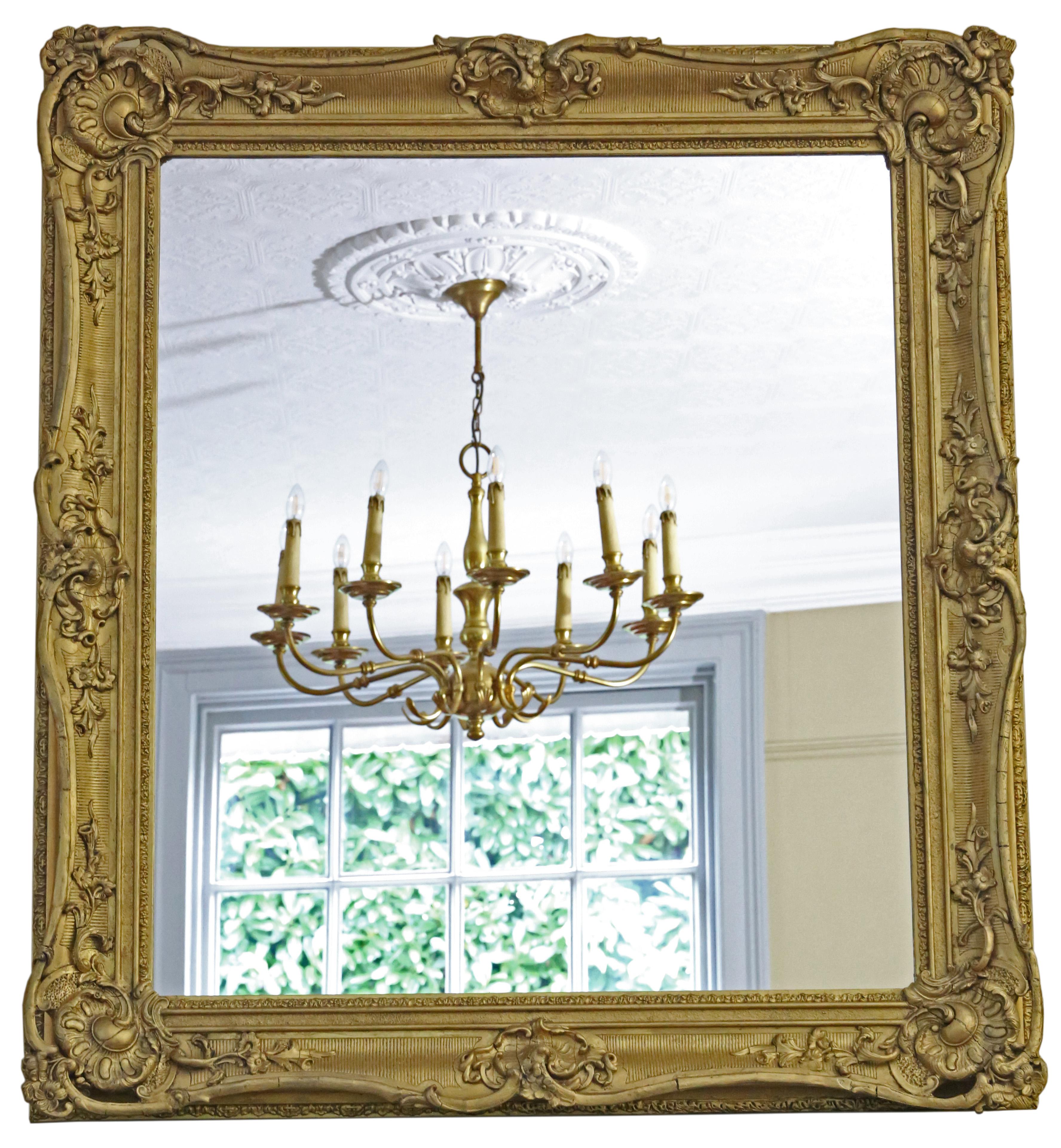 Antique 19th Century large quality gilt overmantle wall mirror. Lovely charm and elegance.

This is a lovely, rare mirror. A bit different and quite special.

An impressive find, that would look amazing in the right location. No loose joints or