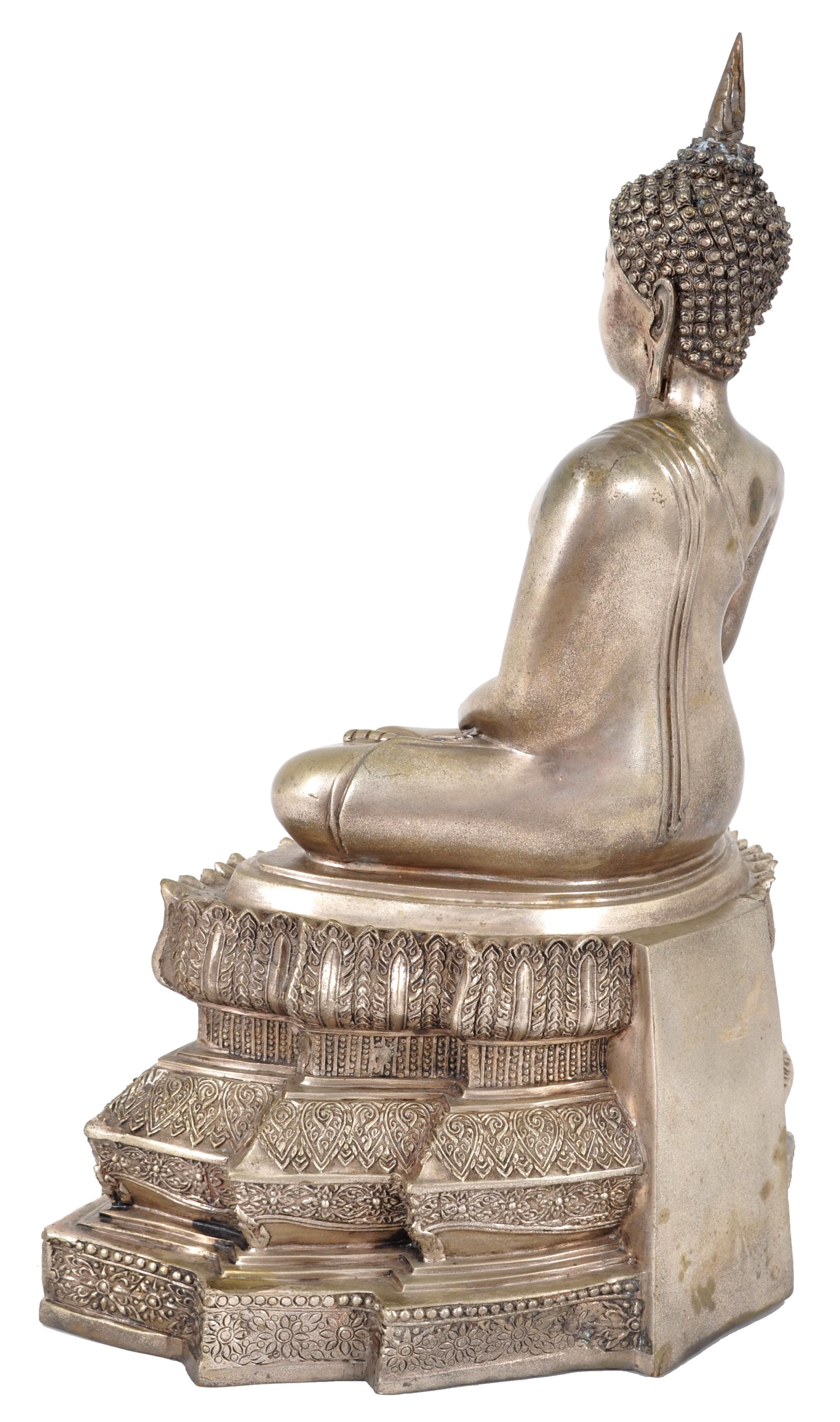 large silver buddha statue