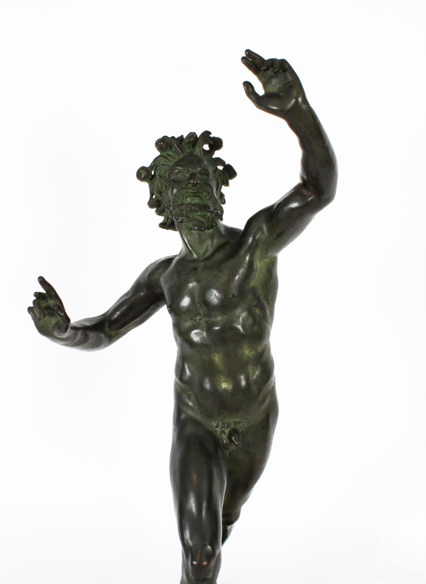 This is a monumental Italian bronze sculpture of Pan the Roman fertility God of the forest, signed G. Nisini, Roma, circa 1830 in date.
 
The sculpture features Pan dancing naked, he has horns, flowing hair and a tail. The statue rests on a