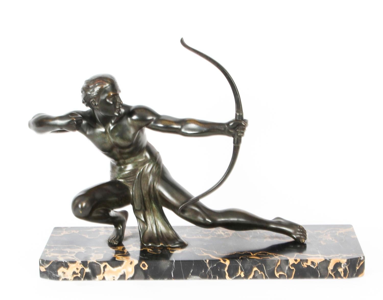 This is a magnificent large antique Italian Art Deco bronze sculpture of a semi-nude Archer, by the famous Italian sculptor, Salvatore Melani (1902-1934) and bearing his signature, circa 1920 in date.
 
This stunning sculpture features the