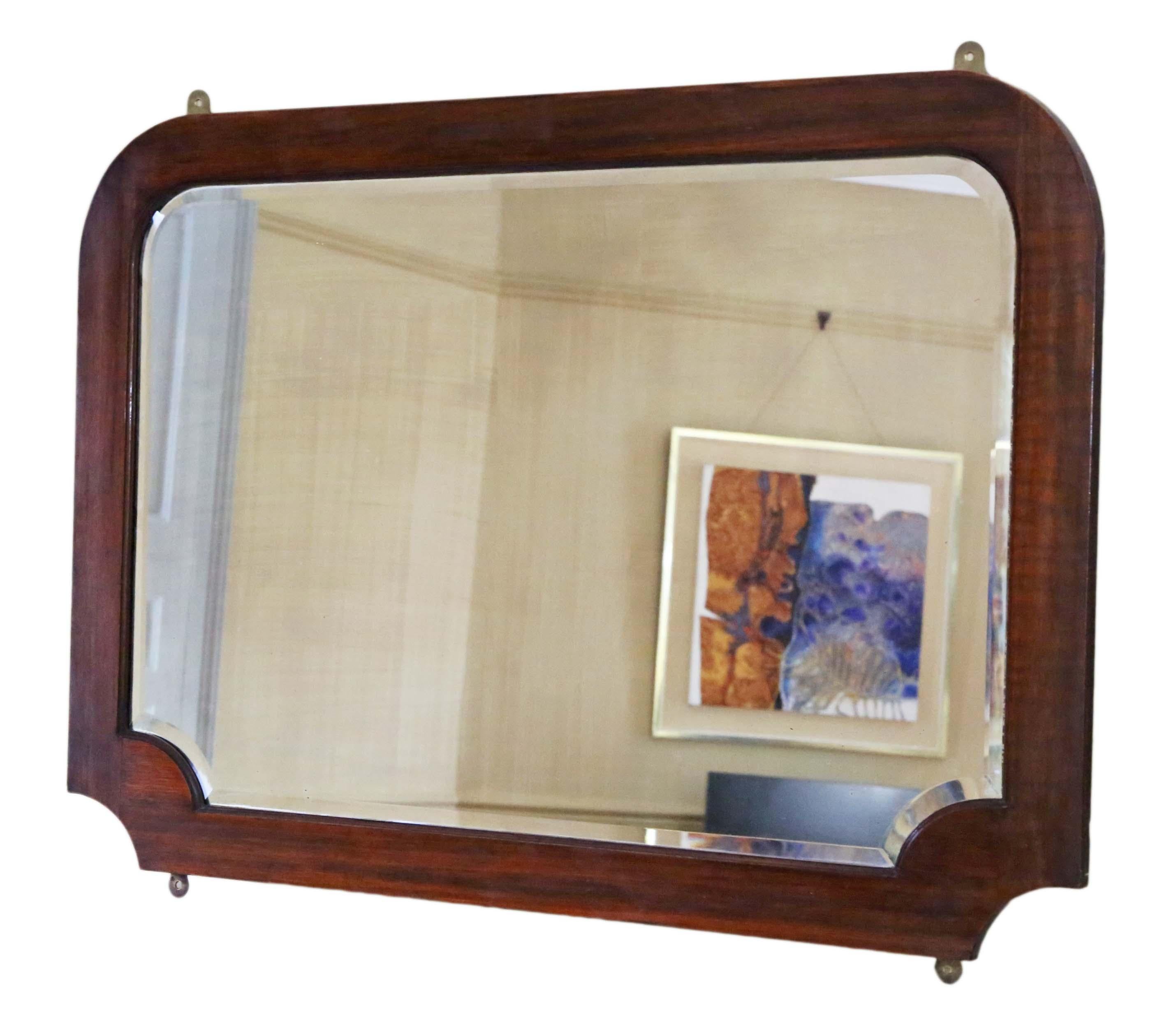 Antique large quality Art Nouveau mahogany wall mirror or overmantle, C1915. Lovely simplicity charm and elegance.

An impressive find, that would look amazing in the right location. No loose joints or woodworm.

Original bevel edge mirrored