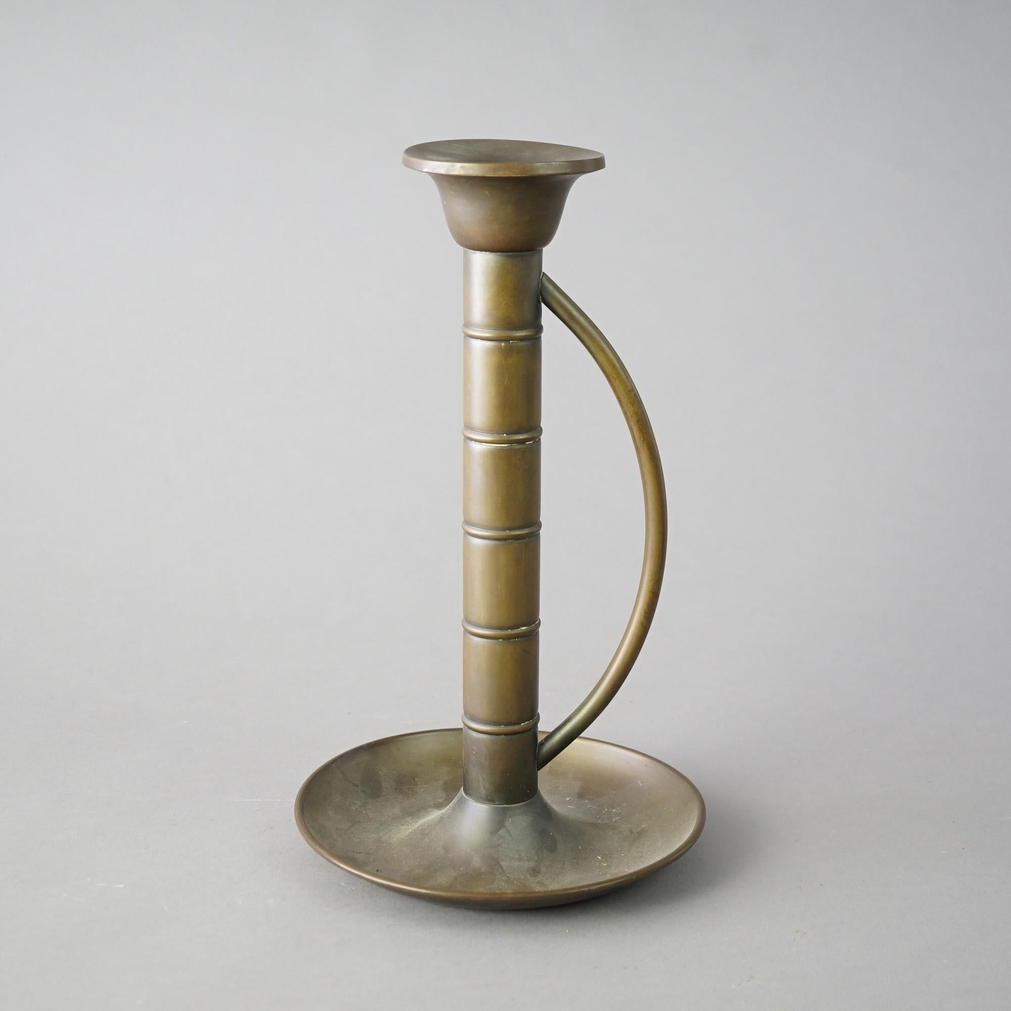 An antique oversized Mission style candle stick by Bradley And Hubbard, c1915

Measures - 14
