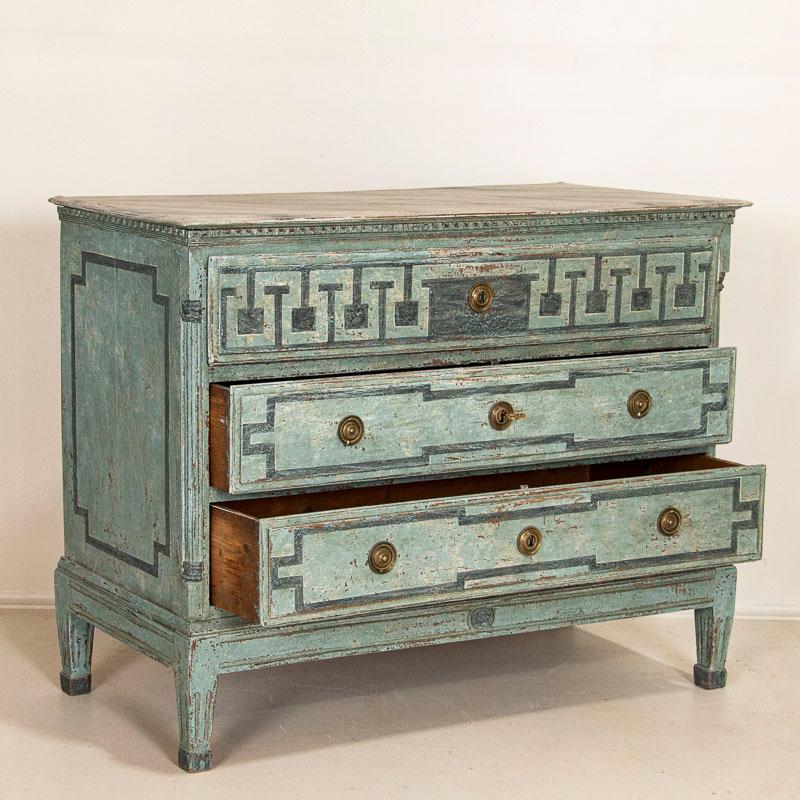 The blue painted finish is captivating in this chest of drawers, along with the faux marble (painted) finish of the top. Please examine close up photos to appreciate the multiple layers of blue and cream paint including areas of distress revealing