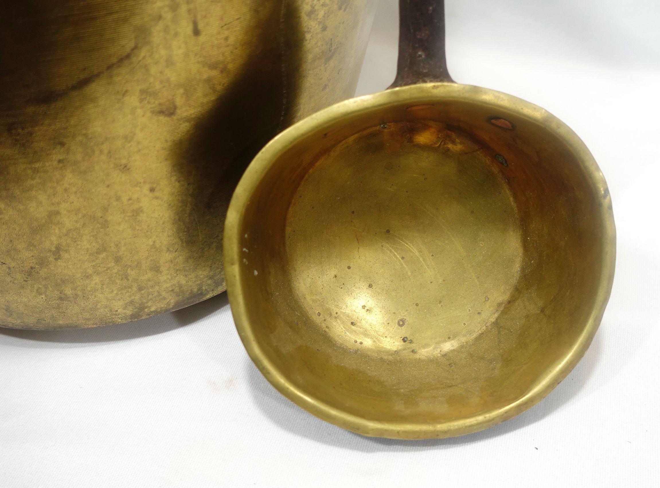 This is a heavy antique, a Large Brass Handled Bucket together with a long Iron Handled Brass Pot.
Total height w/ handle up; 19.5
