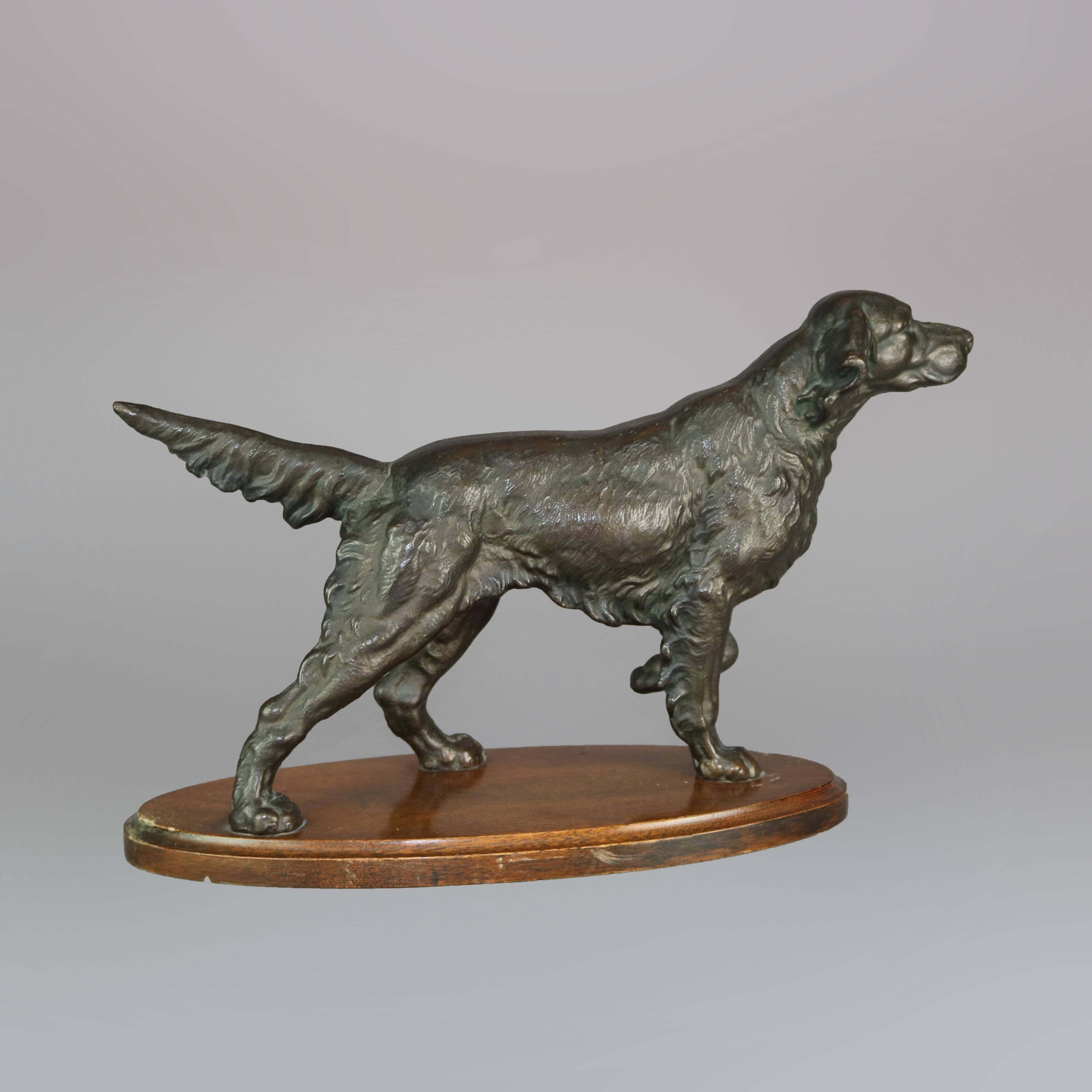 An antique and large cast bronze sculpture depicts Irish Setter (bird dog) in point, mounted on mahogany base, c1920

Measure: 9.5