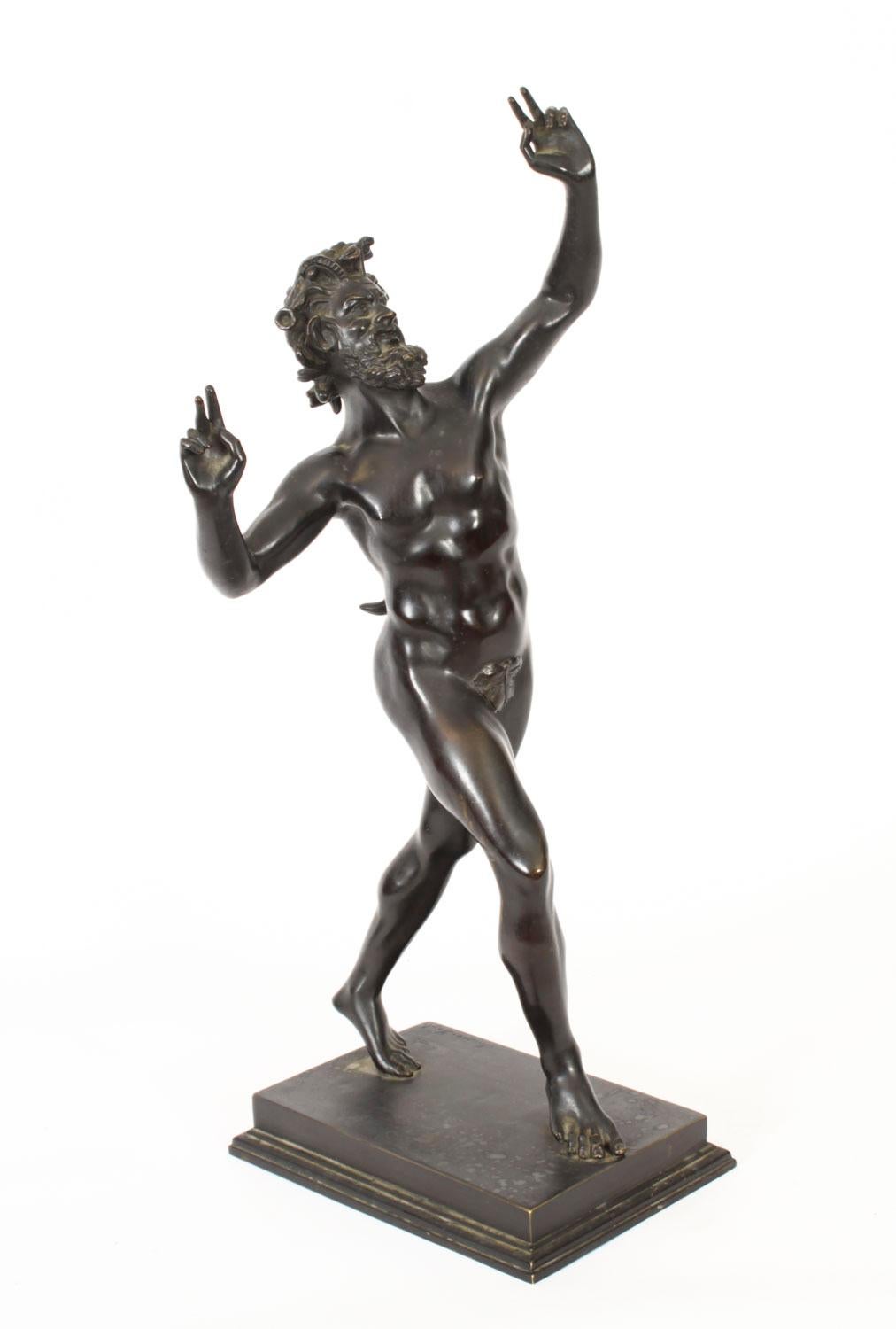 This is a large French Grand Tour bronze sculpture of  Pan the Roman fertility God of the forest issued by the 